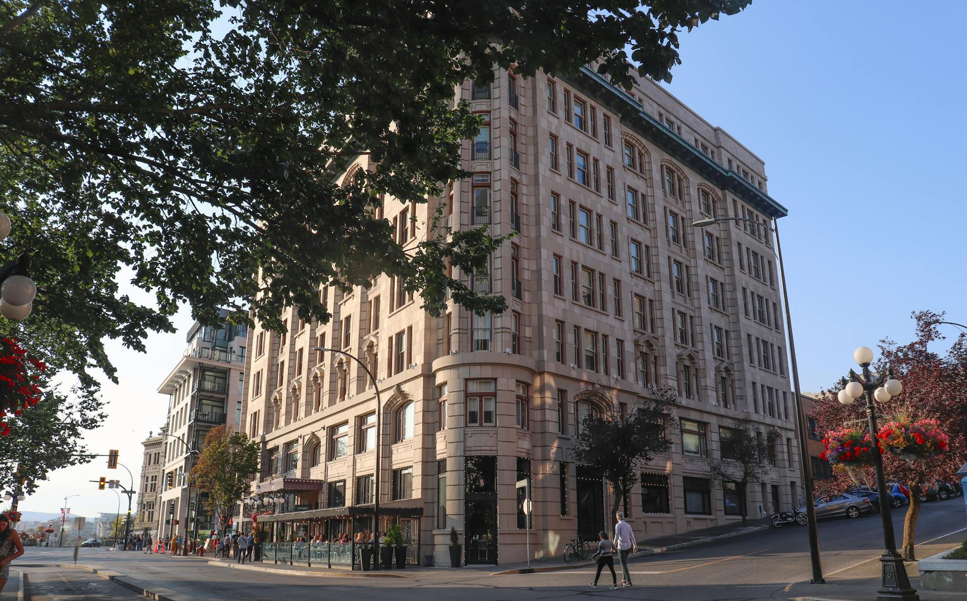 Historic building on a city street corner in morning light