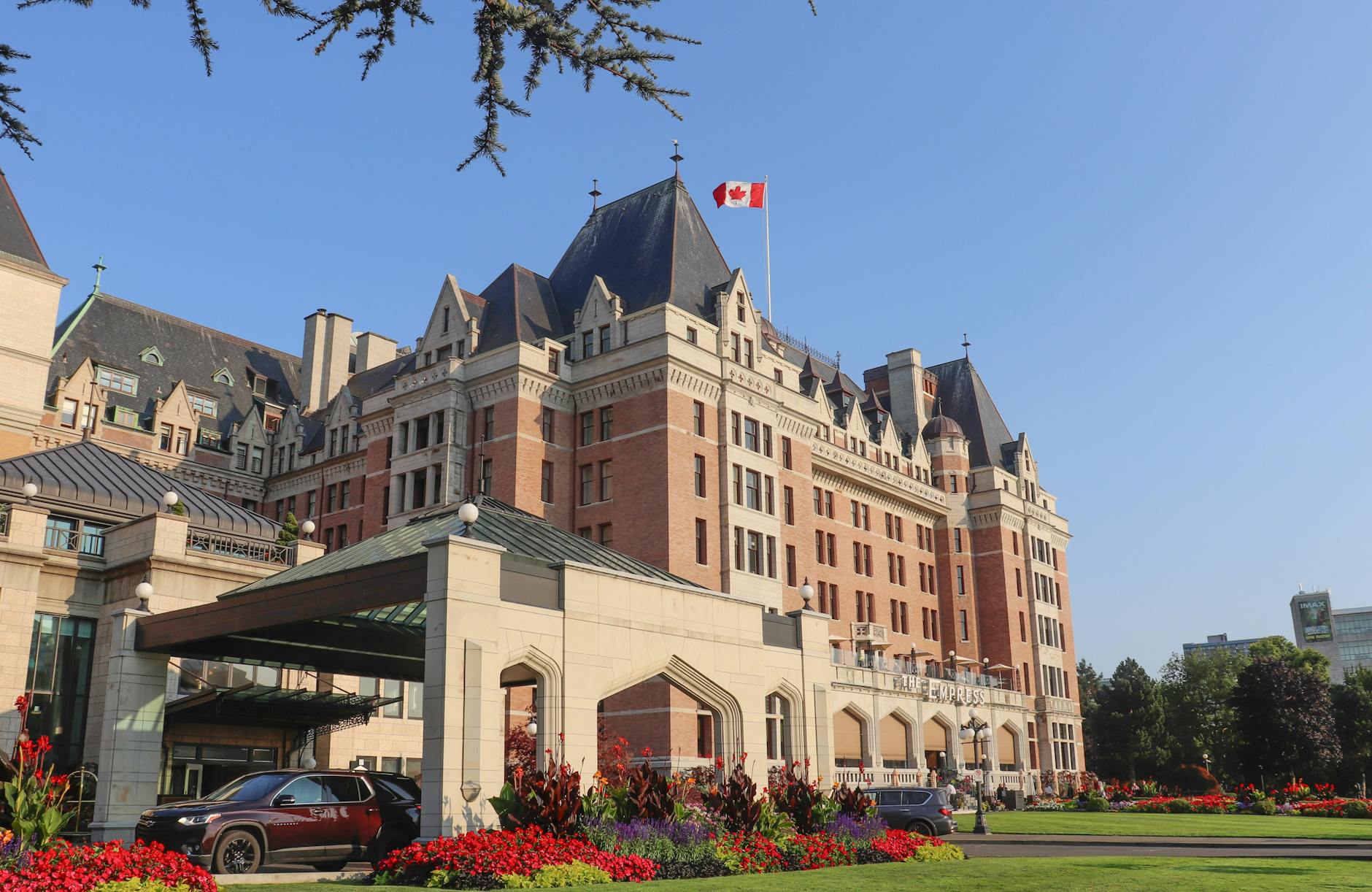 Fairmont Empress Hotel with Canadian flag in Victoria