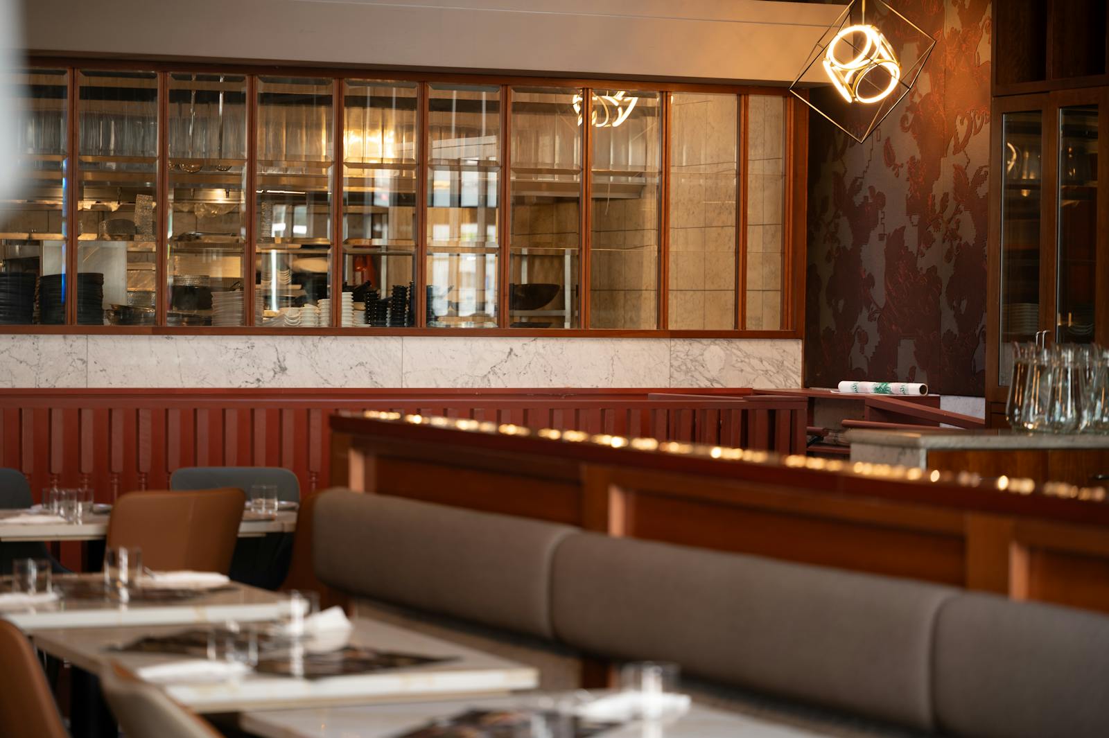 Sophisticated dining setting in a Vancouver restaurant with modern decor and warm ambiance.