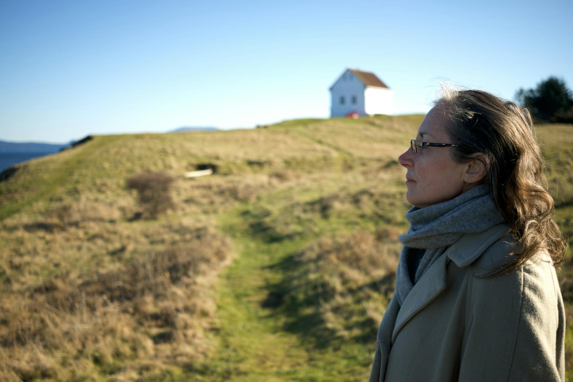 Woman enjoying a sunny day in grasslands near Victoria