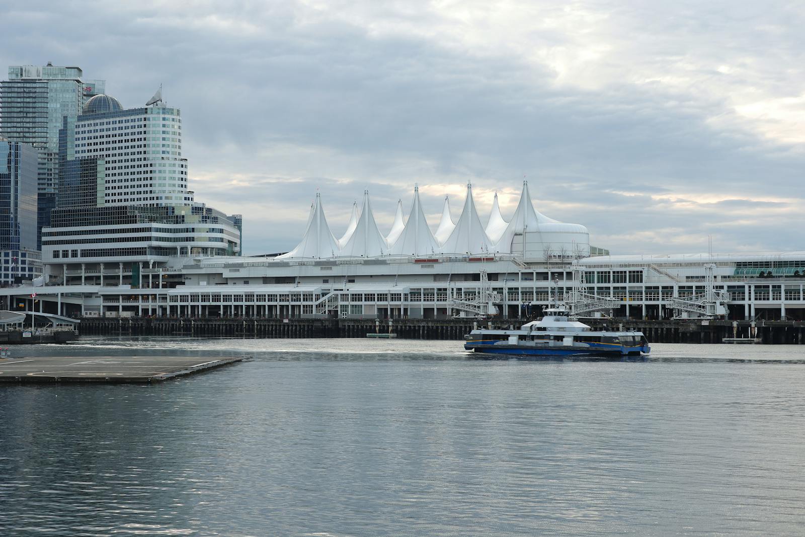 View of Canada Place and ferry on Vancouver's waterfront, British Columbia.
