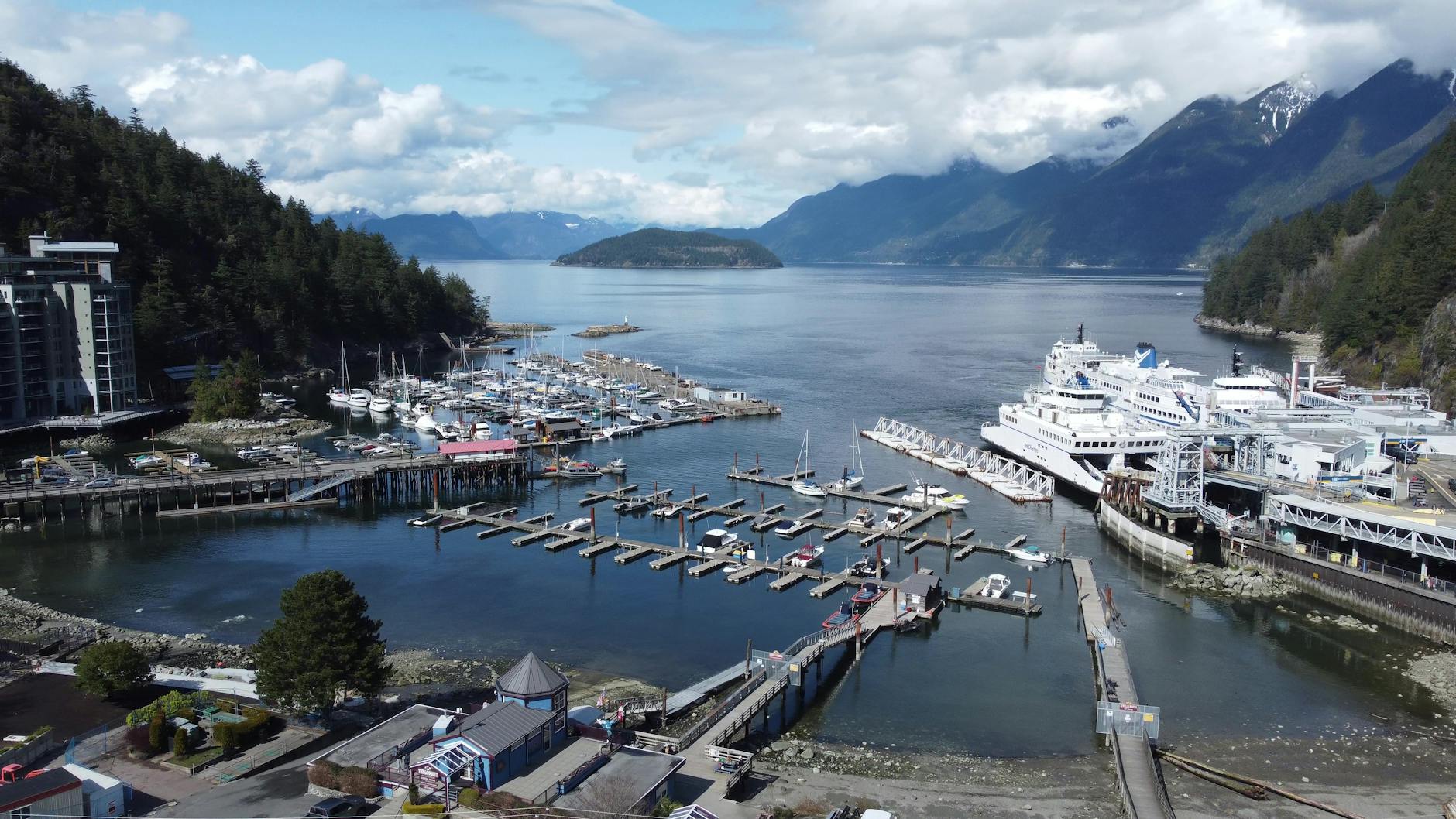 Aerial view of a harbor surrounded by mountains
