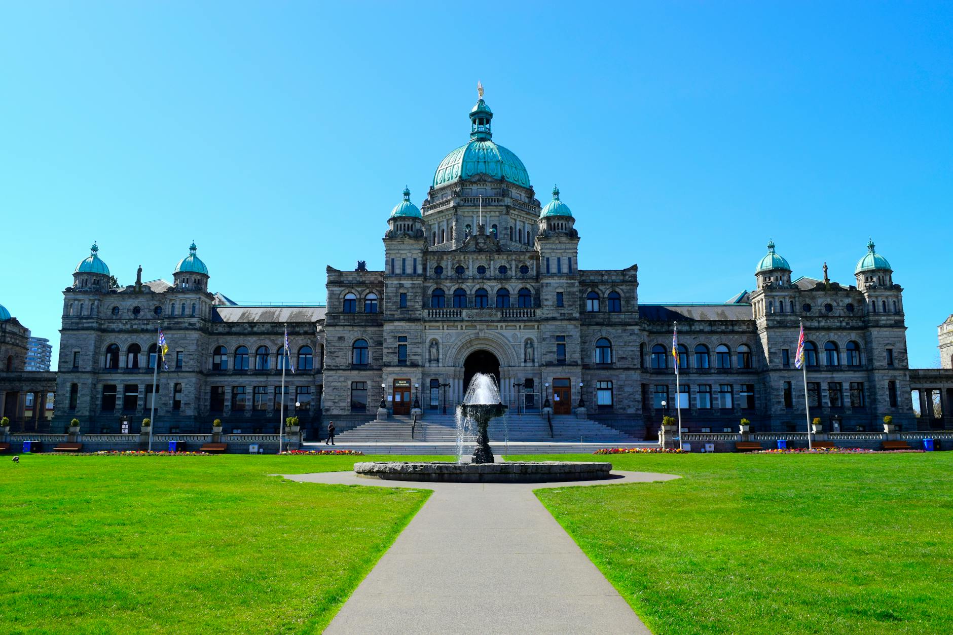 British Columbia Parliament Building under a clear blue sky