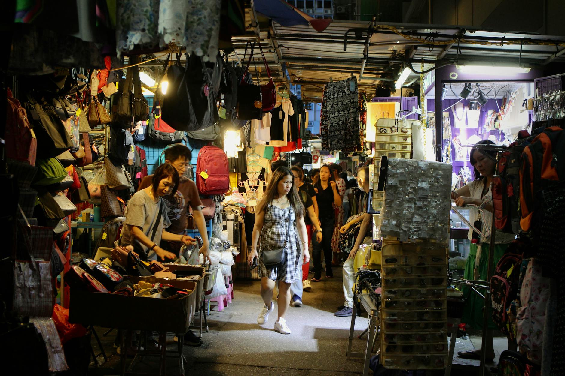 Wan Chai night street and budget traveler report planning context.