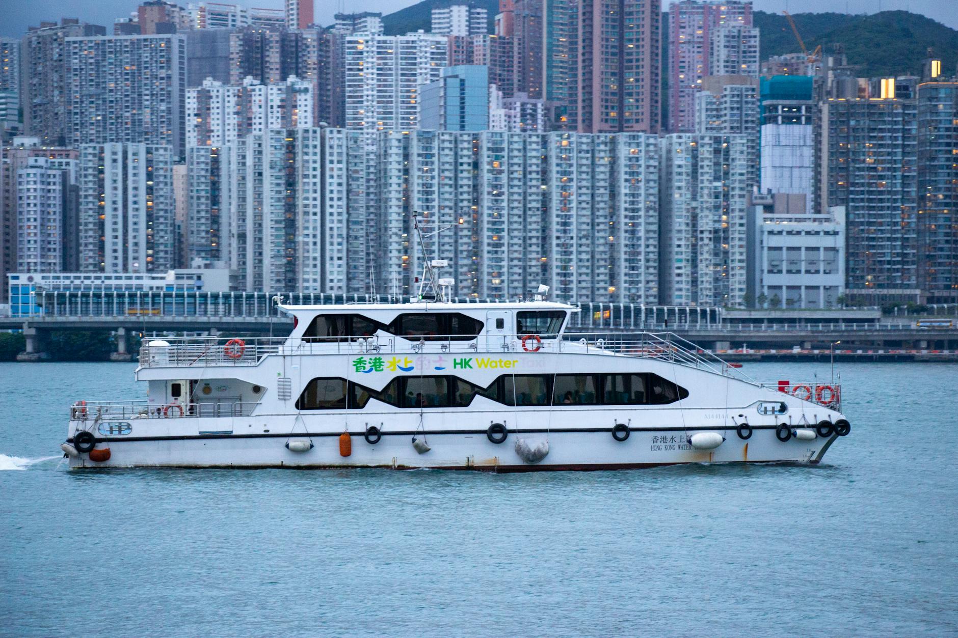 Wan Chai harbor and conference cross-harbor route planning context.