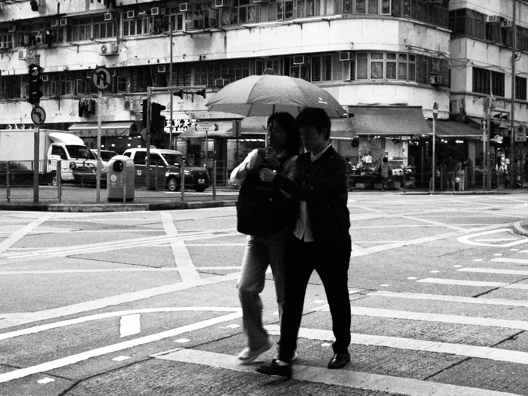 Wan Chai rainy street and conference weather planning context.