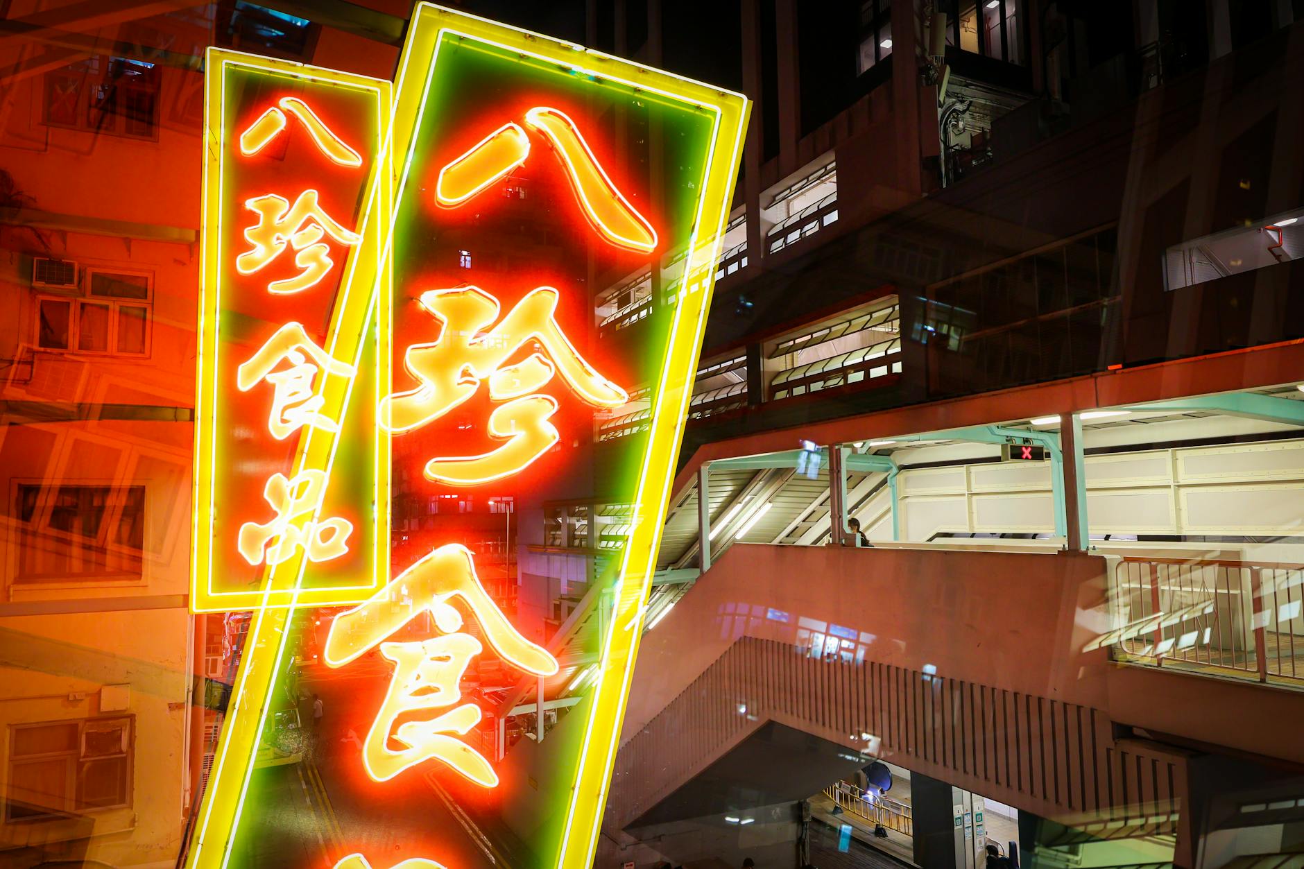 Hong Kong night street and late transport planning context.