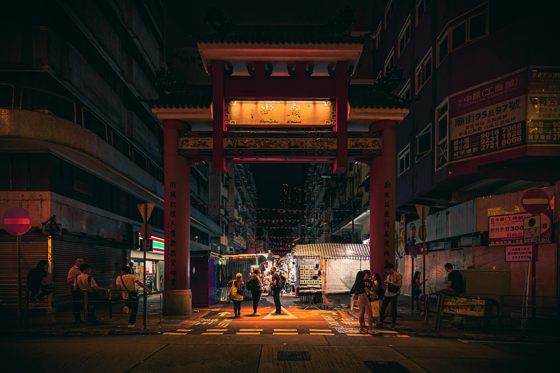 Rainy Hong Kong street and religious traveler weather margin context.