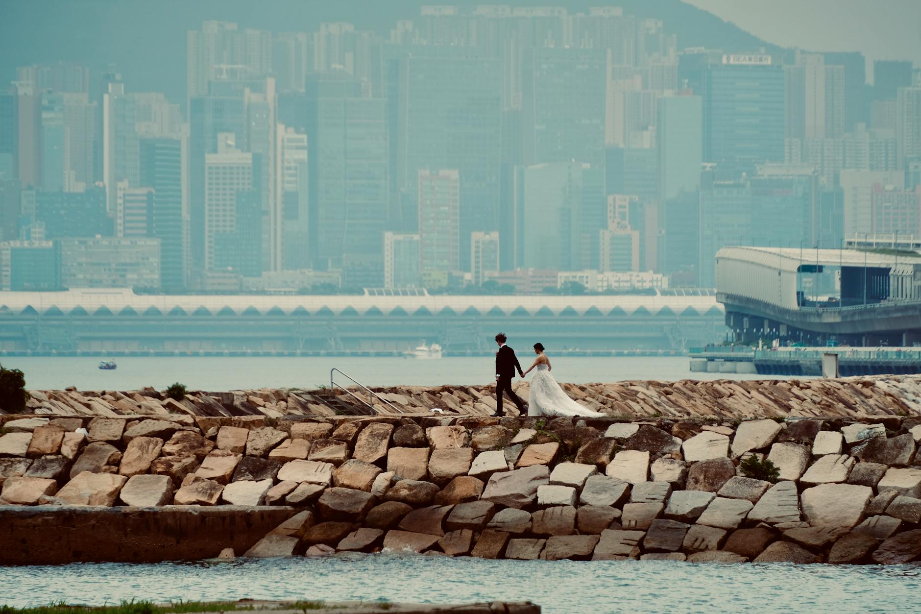 Hong Kong harbor walk and religious traveler movement planning context.