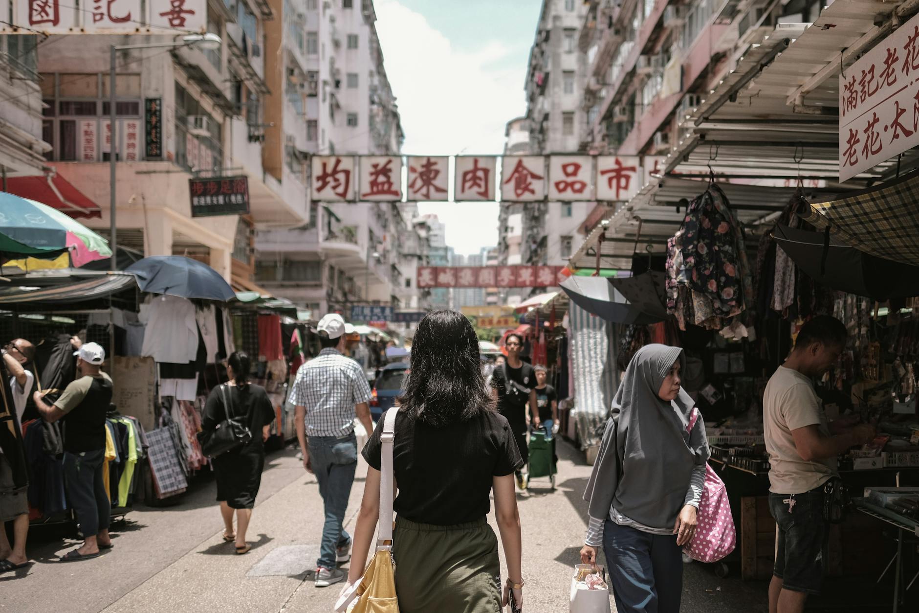 Wan Chai market street and repeat visitor route planning context.