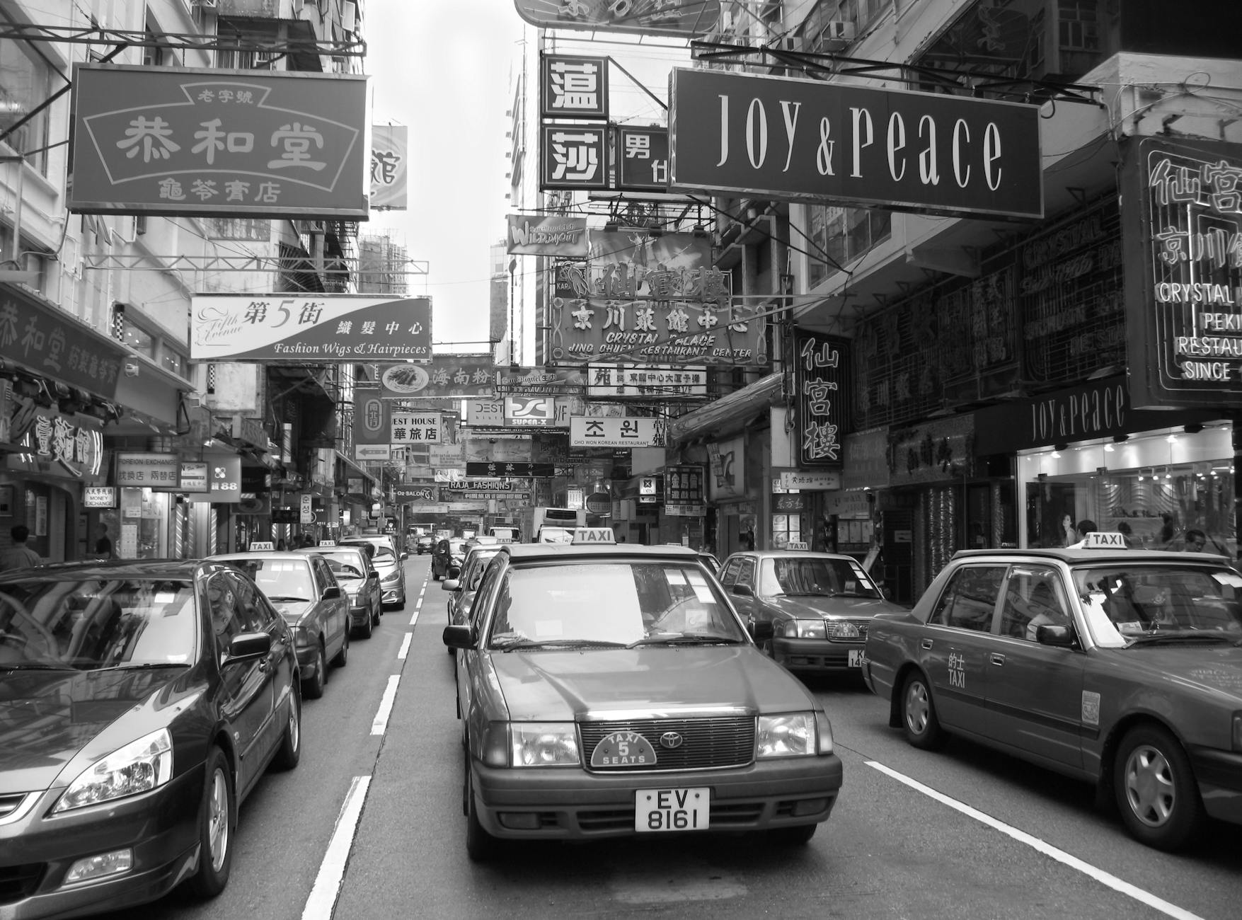 Wan Chai taxi and tram sales traveler transport planning context.