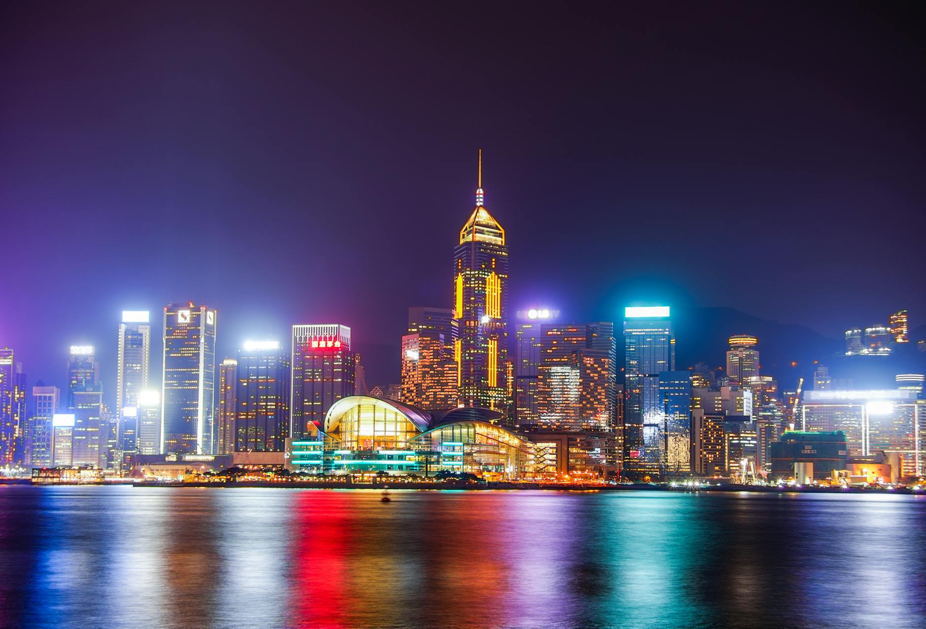 Wan Chai night skyline and sales traveler report planning context.
