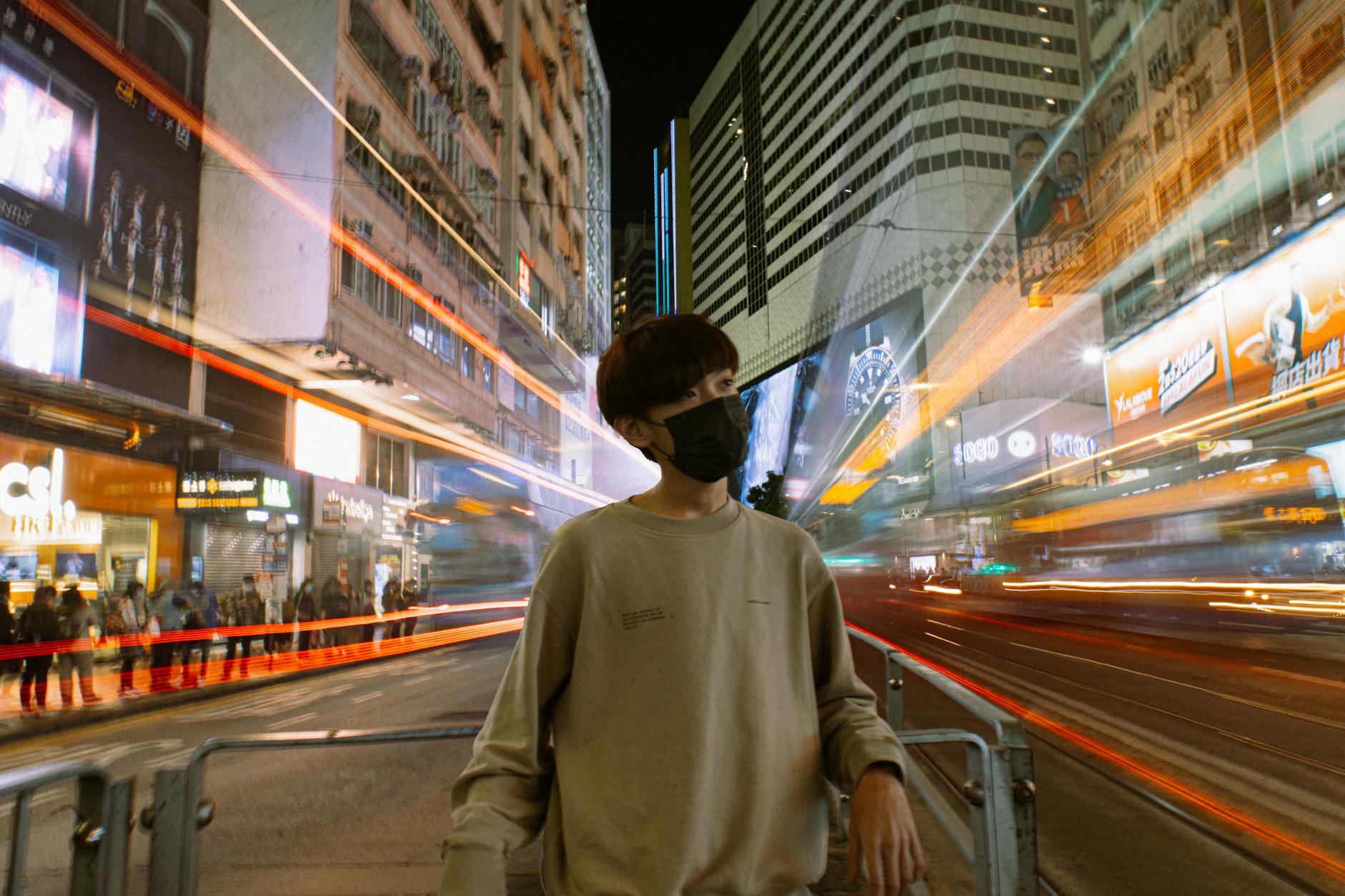 Wan Chai evening street and student group-plan boundary context.