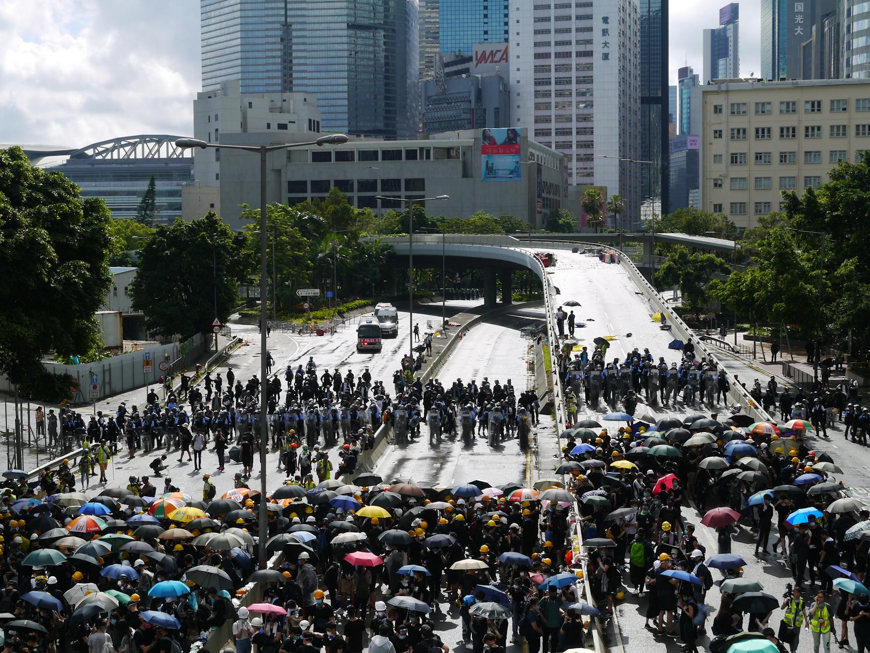 Wan Chai convention crowd and trade-show weather planning context.