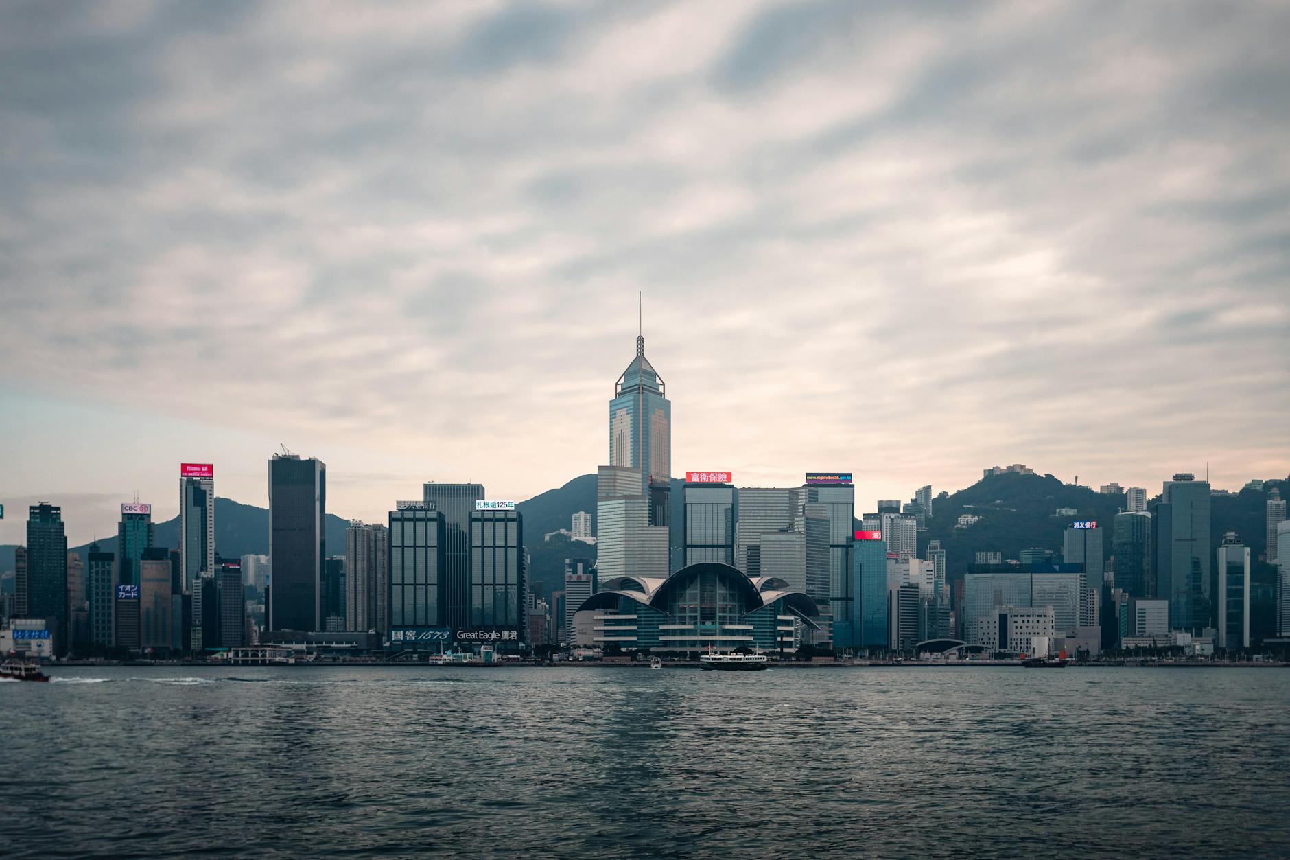 Wan Chai skyline and stopover report planning context.
