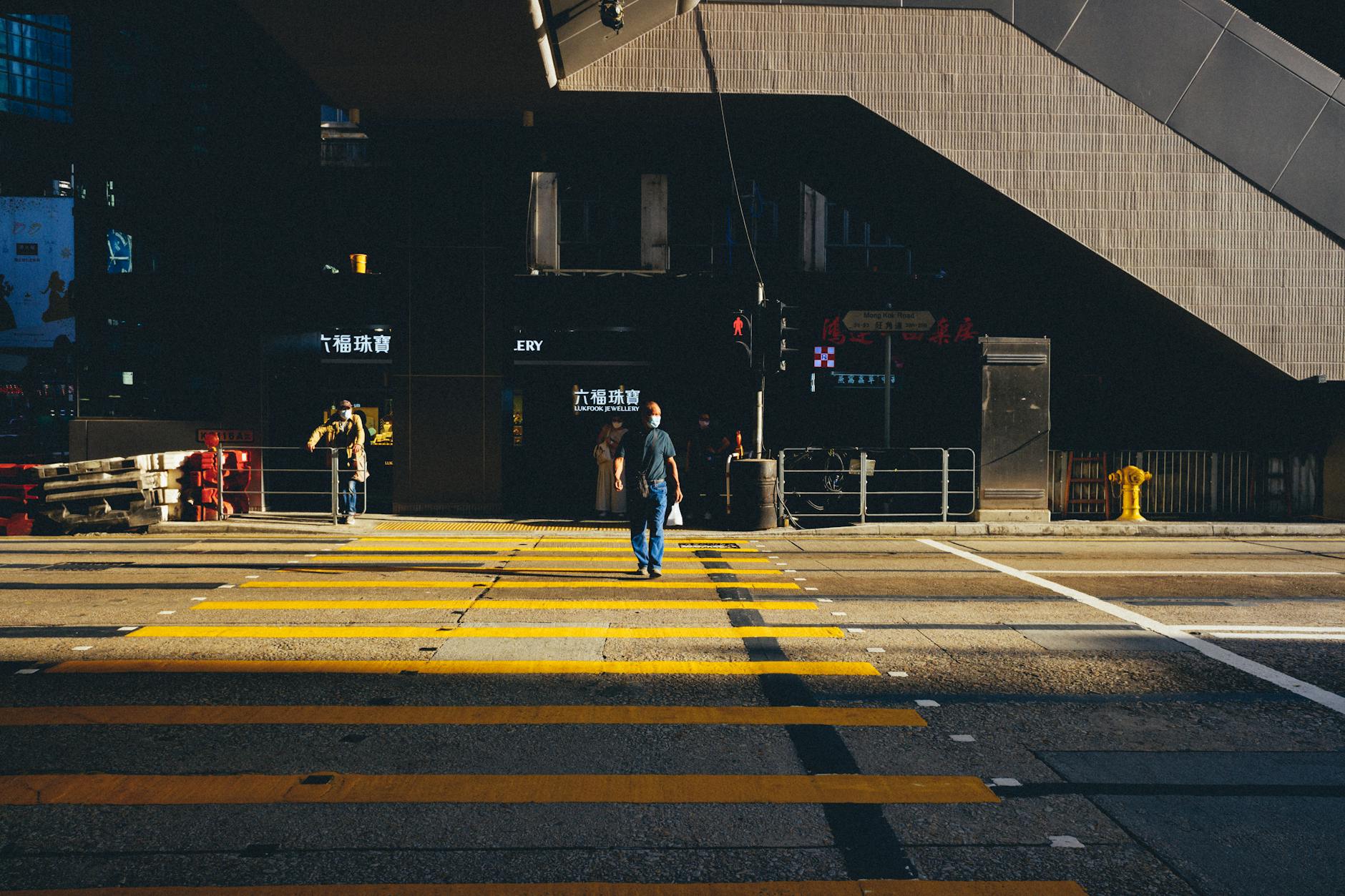 Wan Chai crossing and medical-constraints pacing context.