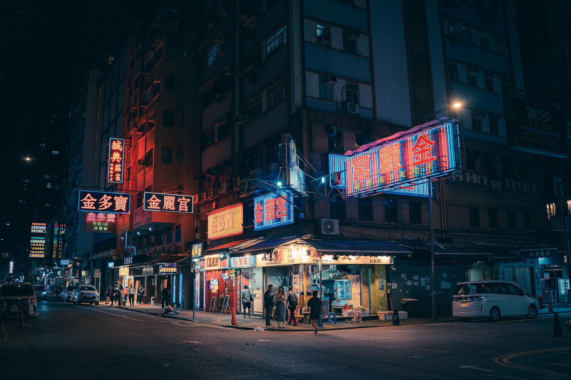 Wan Chai night street and woman traveler safety planning context.