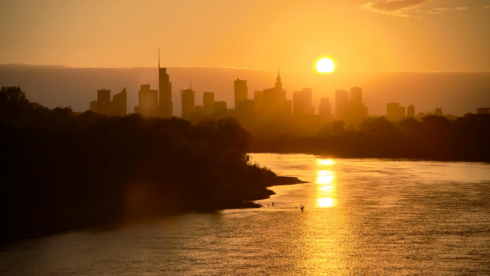 Warsaw skyline and river for outdoor traveler report planning.