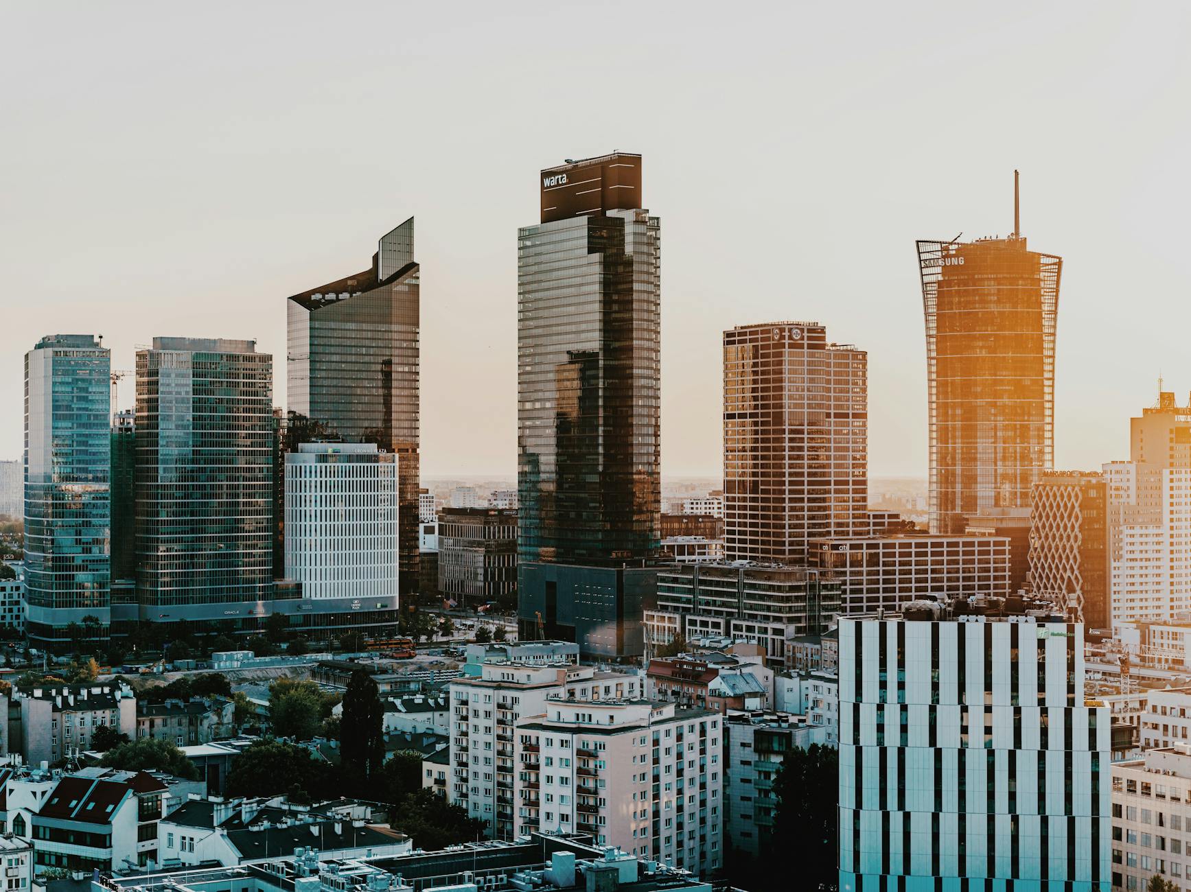 Warsaw evening city skyline for business dinner and recovery planning.