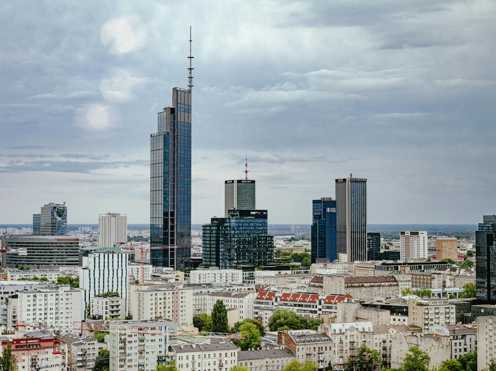 Warsaw urban skyline for business arrival planning.