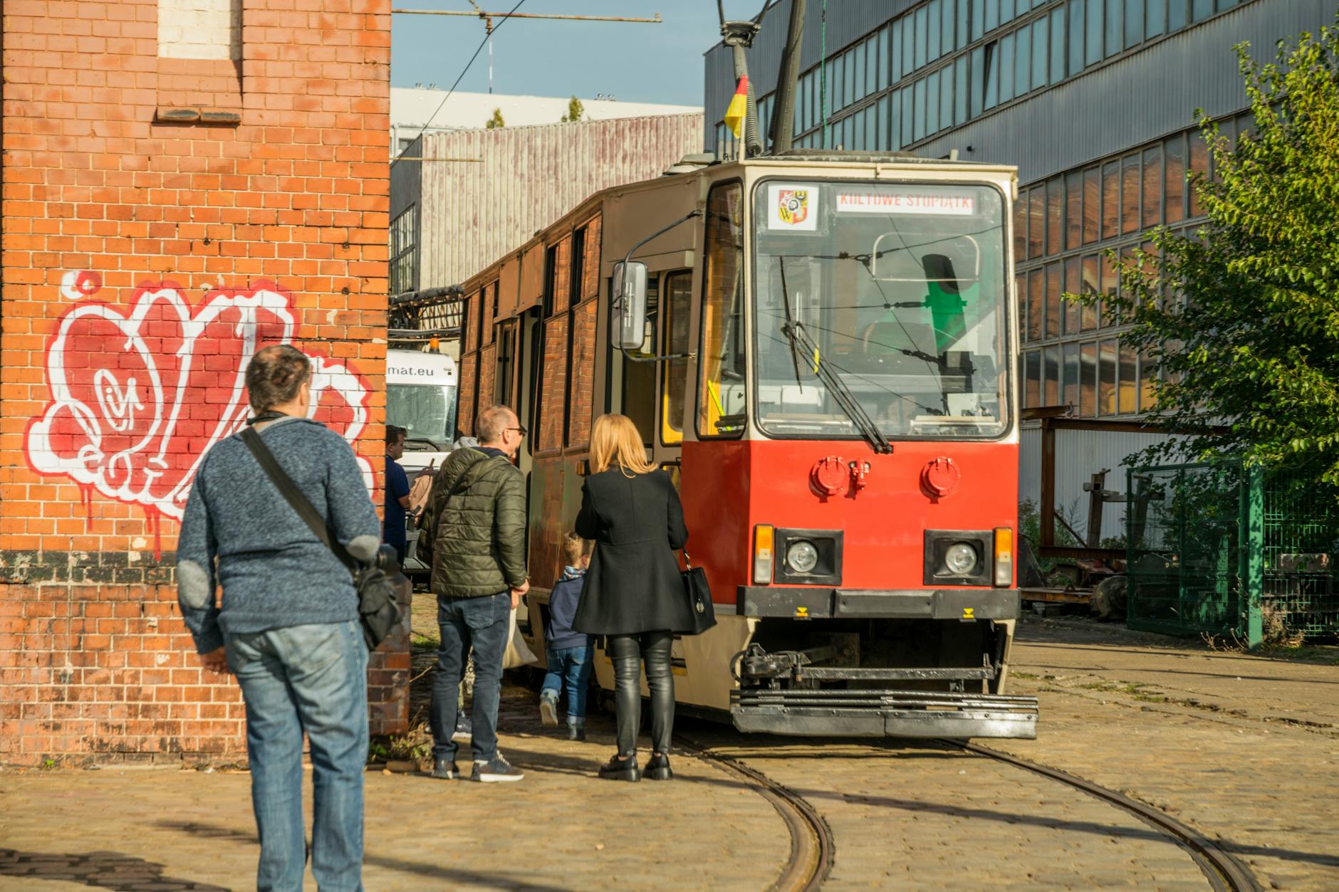 Warsaw tram and city scene for family transport planning.
