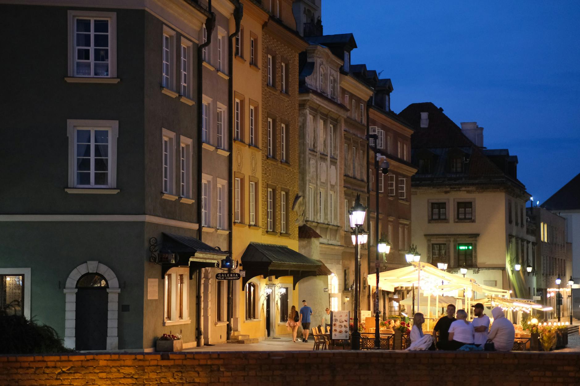 Warsaw old town evening for first-time visitor travel report planning.