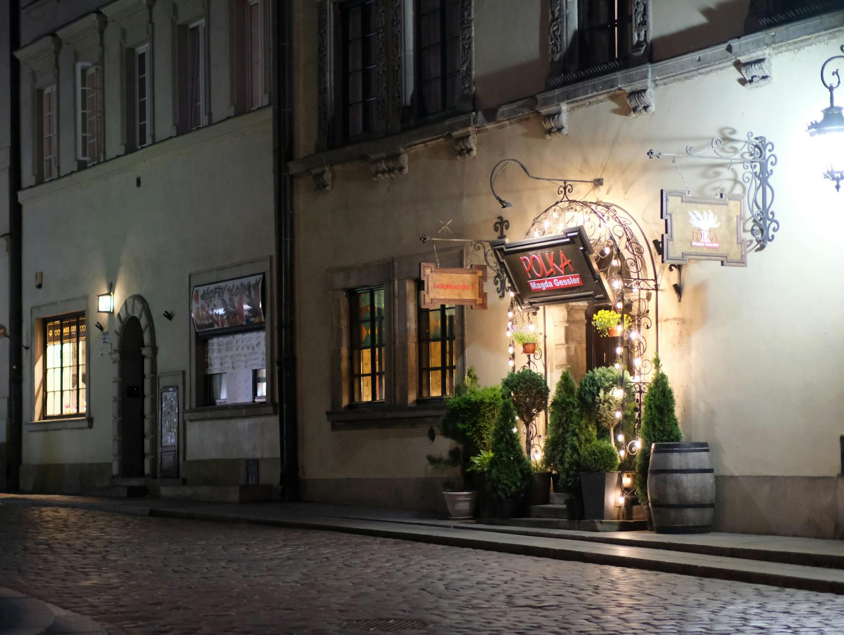 Warsaw old town restaurant street for older traveler evening planning.