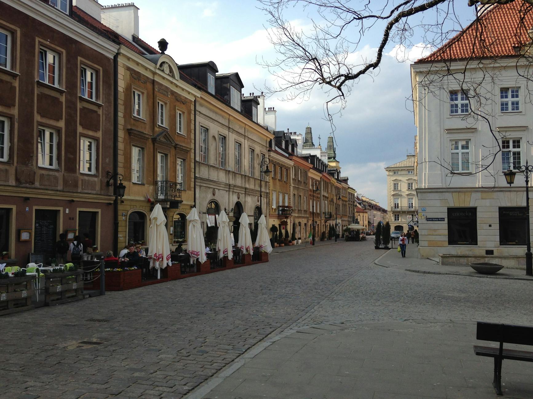Warsaw cafe and street setting for solo traveler base planning.