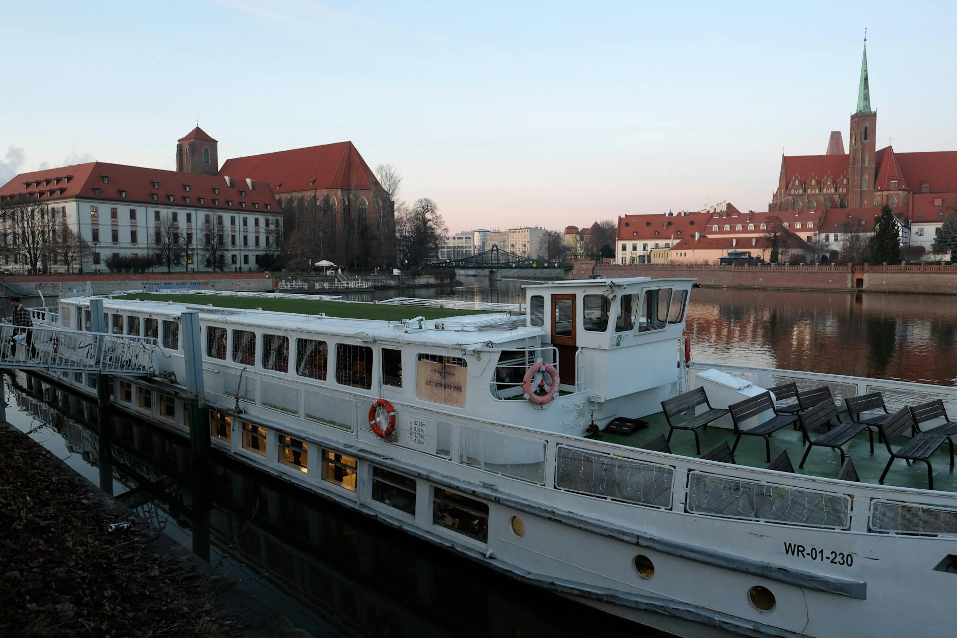 Wroclaw river and bridge setting for port-call planning.