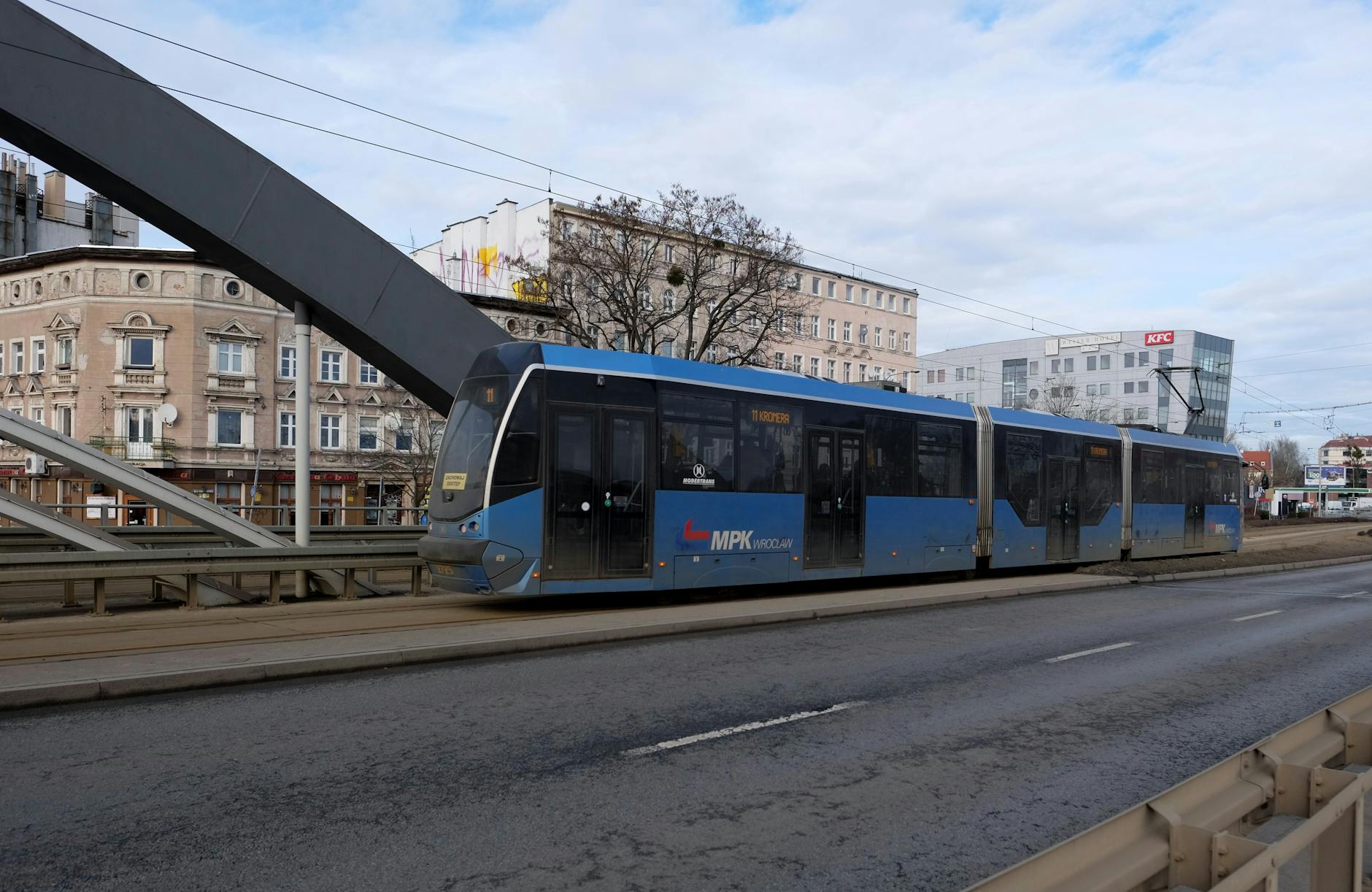 Wroclaw tram and central street for first-time visitor hotel planning.