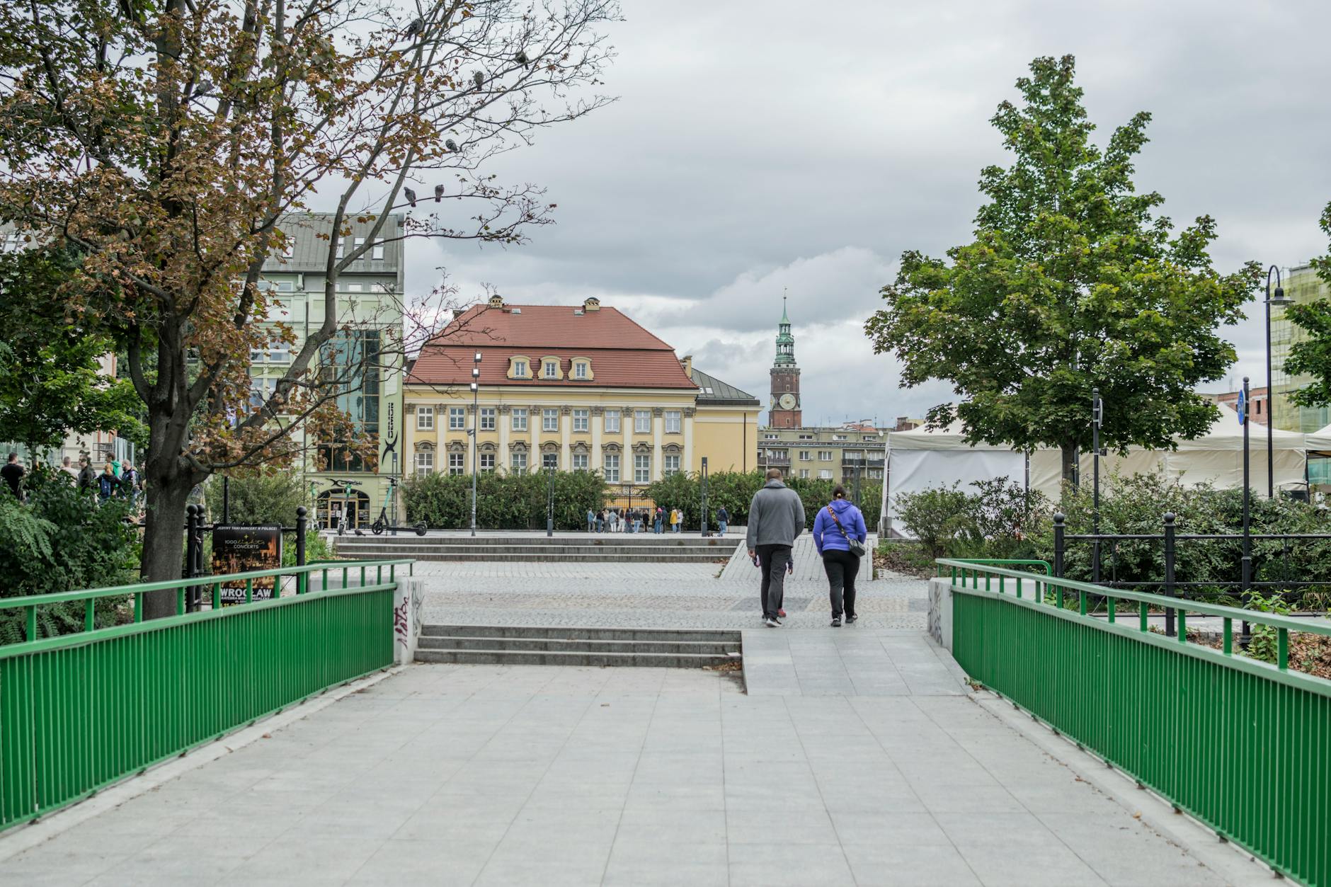 Wroclaw central street for solo lodging and return planning.
