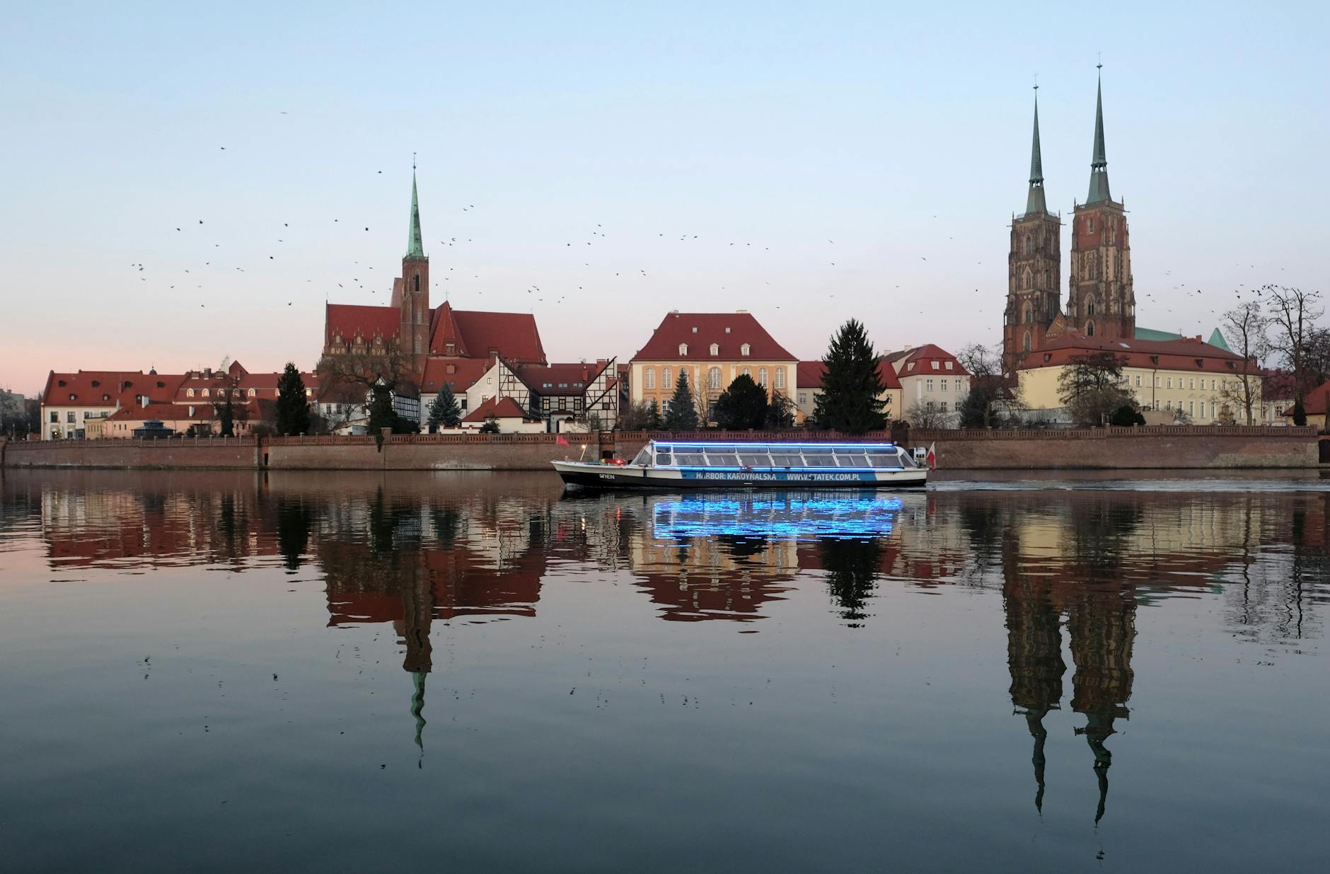 Wroclaw evening city setting for woman traveler night planning.