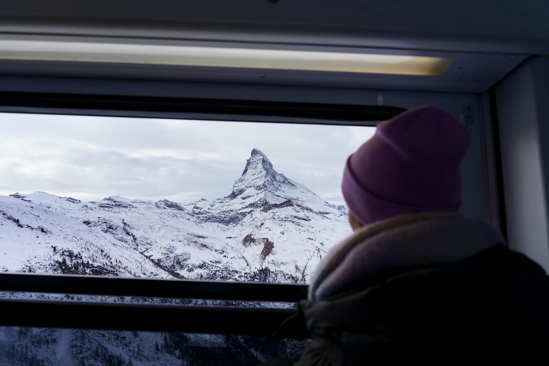 Matterhorn view from a train window for conference travel materials planning.