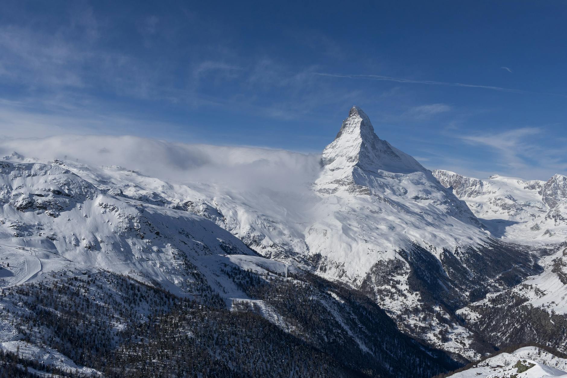 Zermatt slopes and Matterhorn for budget lodging tradeoff planning.