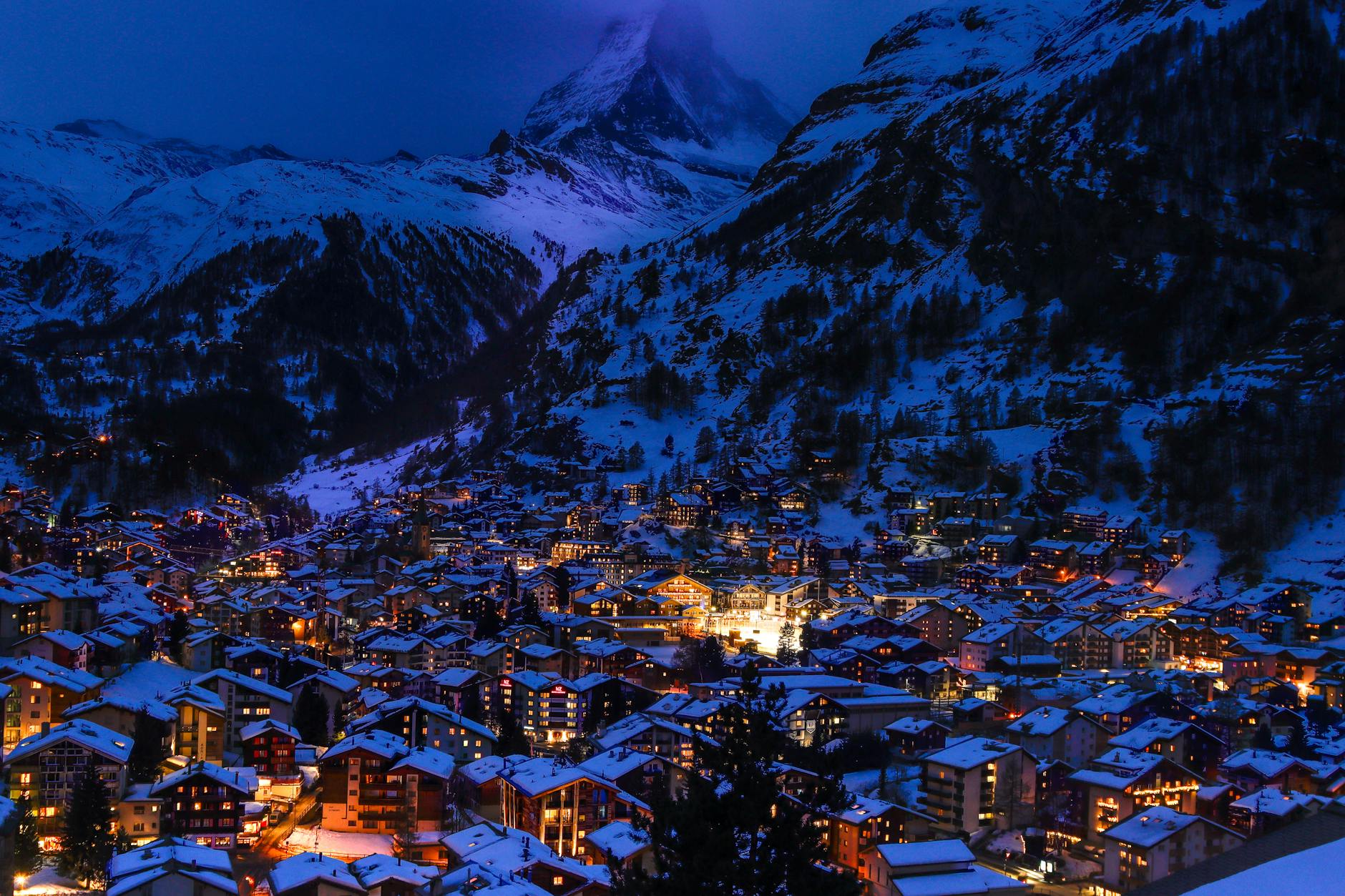 Night view of Zermatt village for weather and evening business planning.