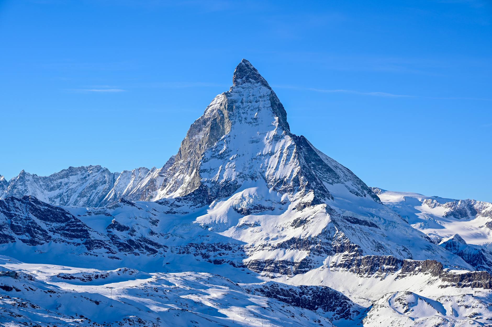 Sunlit Matterhorn for Zermatt conference networking and schedule planning.