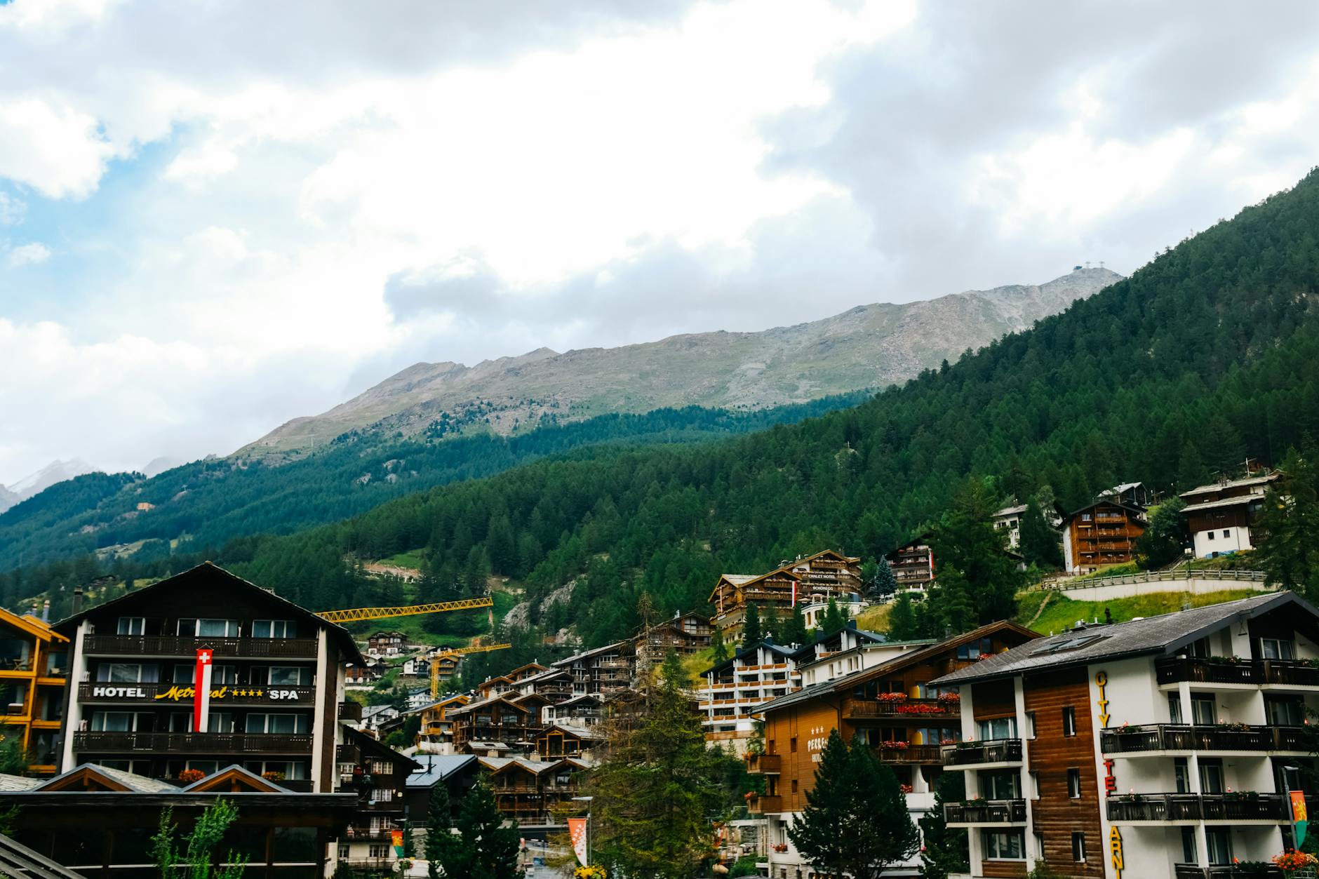 Alpine chalets and mountains for Zermatt luxury hotel planning.