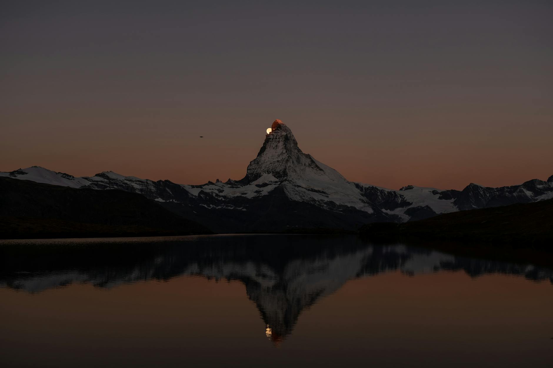 Matterhorn and Zermatt rail landscape for calm pilgrimage arrival planning.