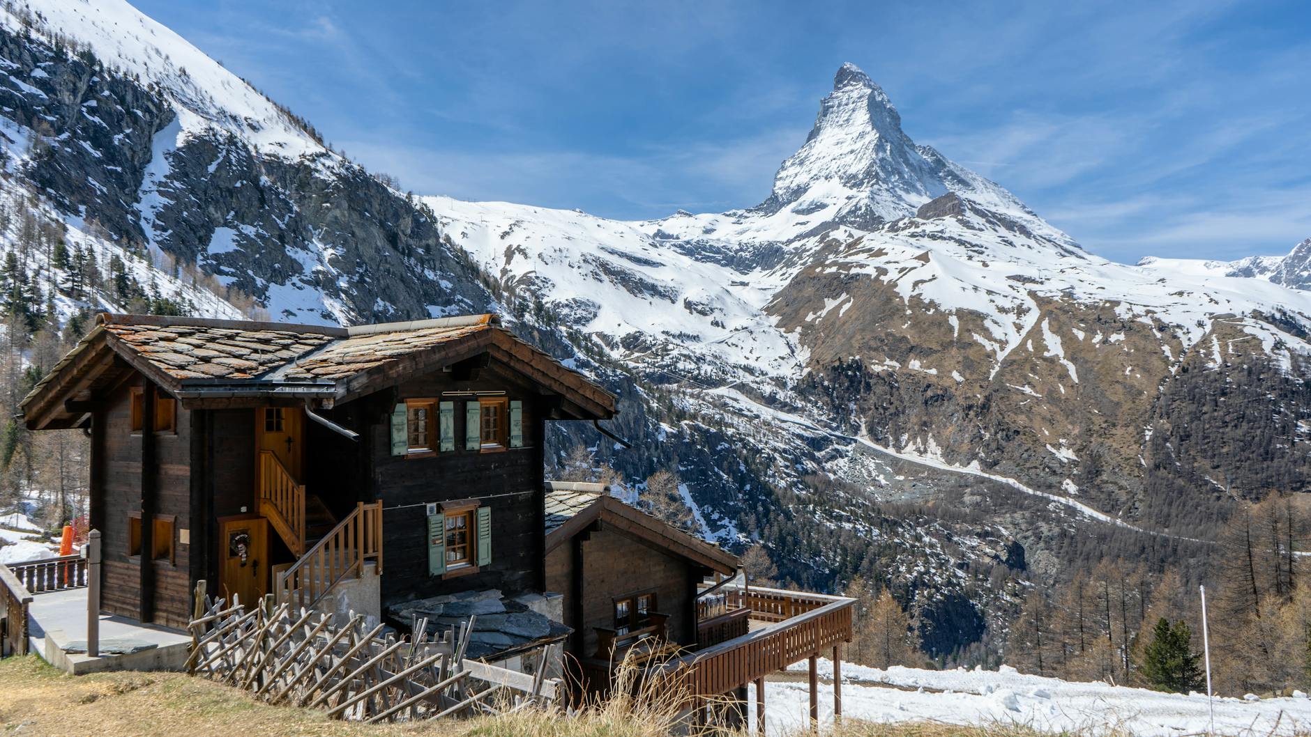 Swiss chalet and Matterhorn for solo Zermatt lodging planning.