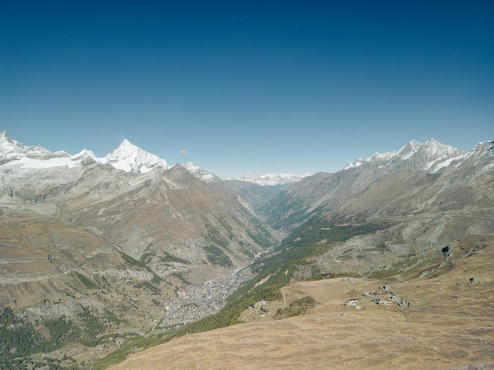 Aerial Swiss Alps view near Zermatt for solo mountain route planning.