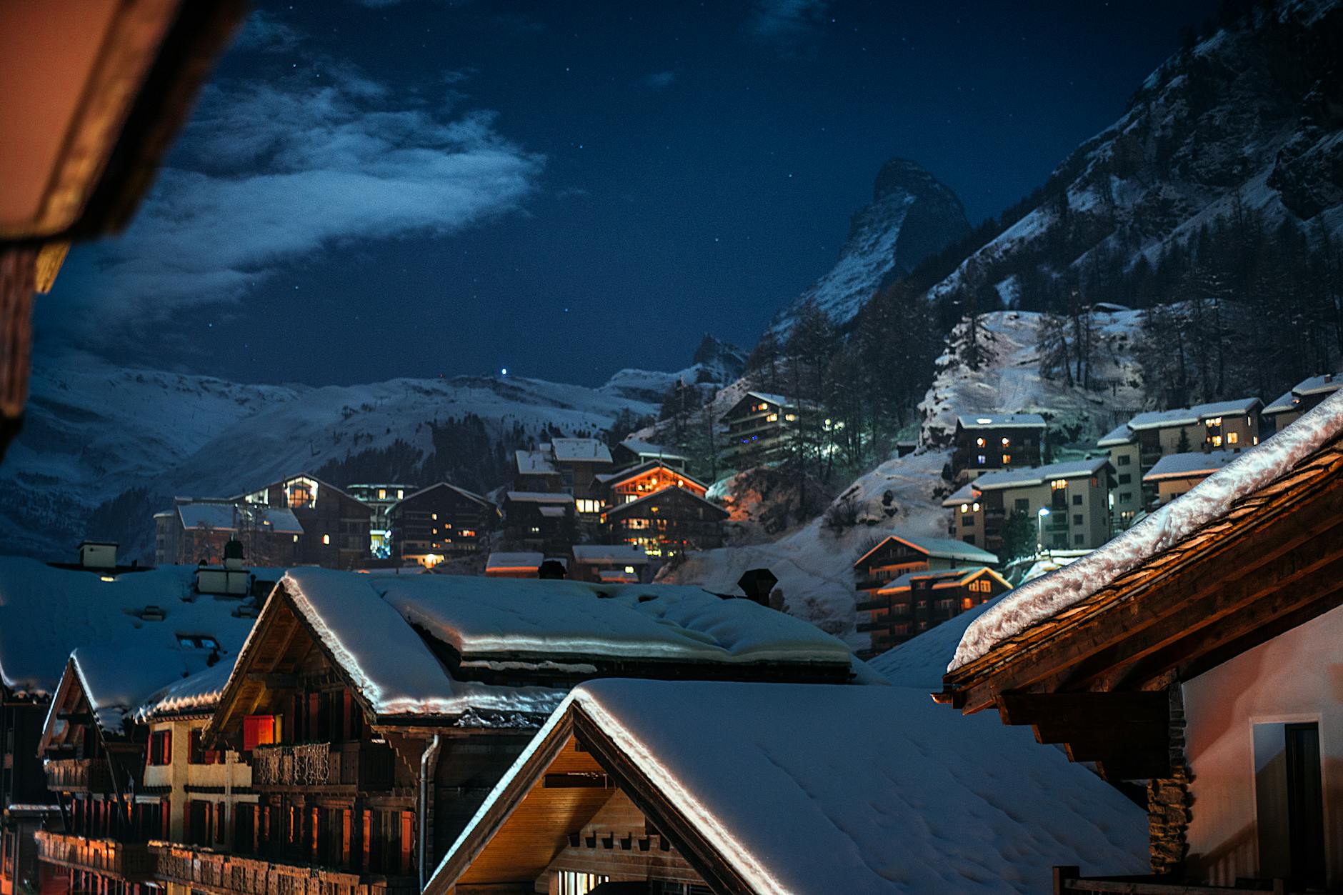 Snowy alpine village at dusk for solo Zermatt pacing decisions.