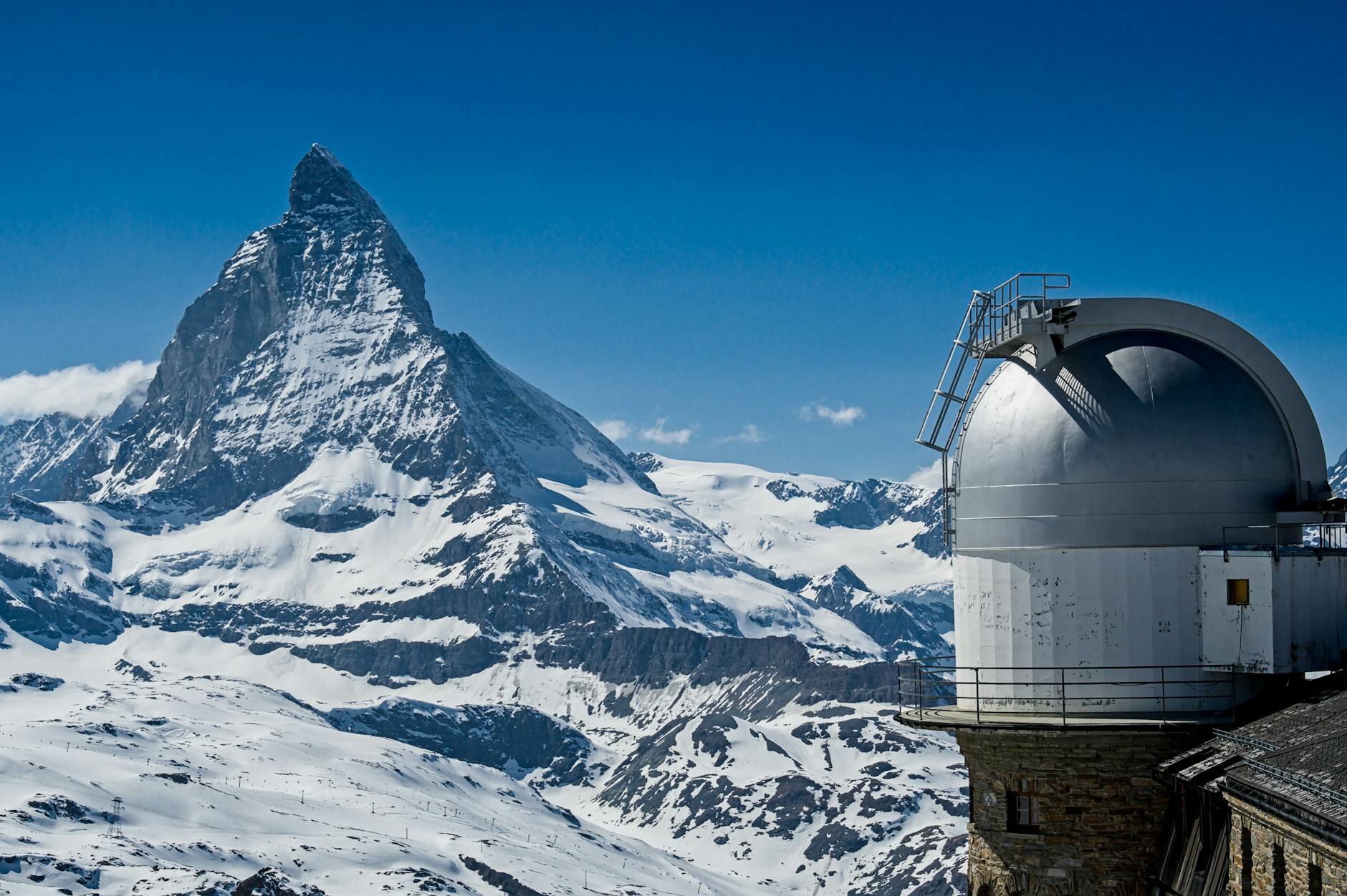 Matterhorn and alpine slopes for Zermatt tourist mountain route planning.