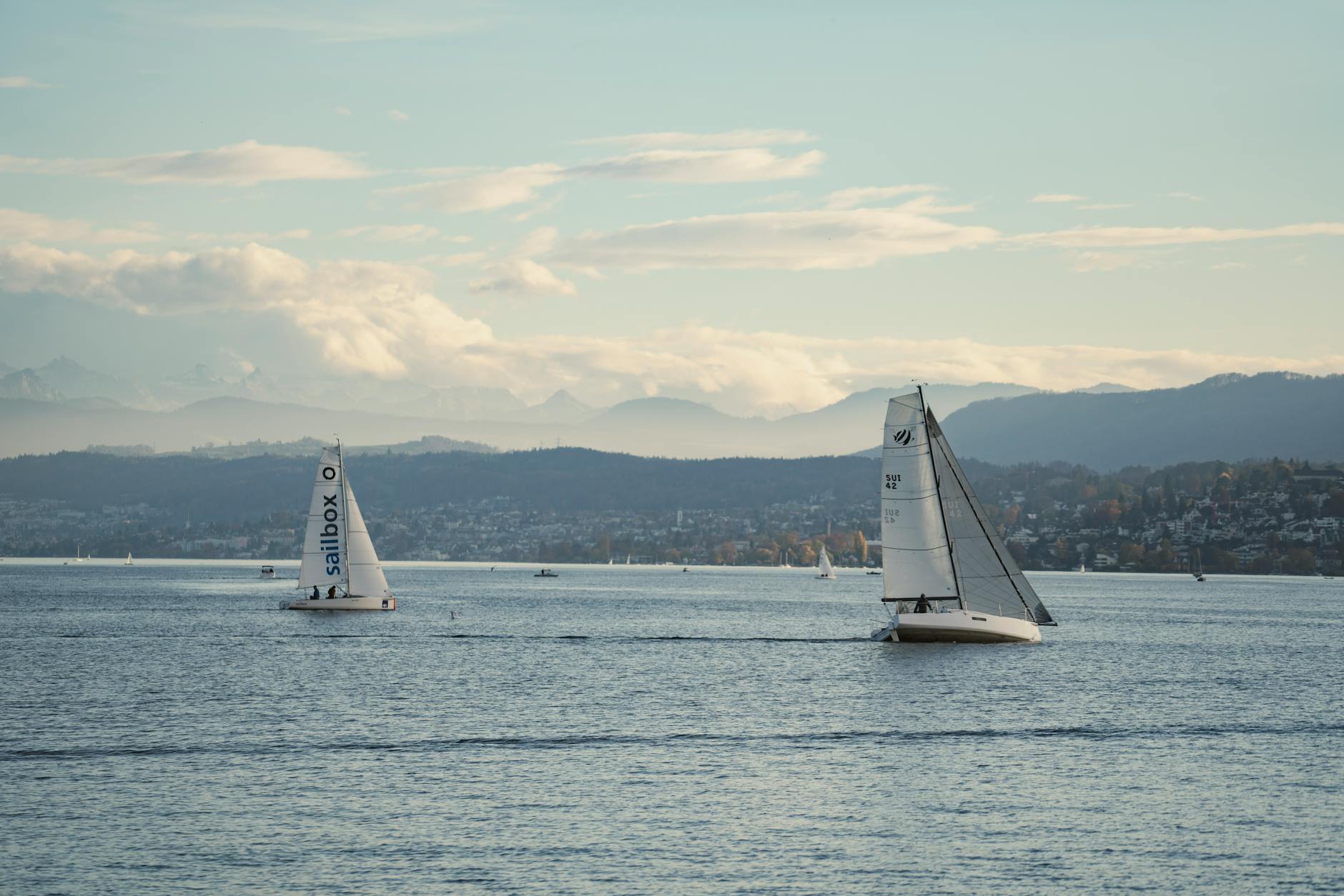 Lake Zurich sailboats and mountain backdrop context for outdoor safety planning.