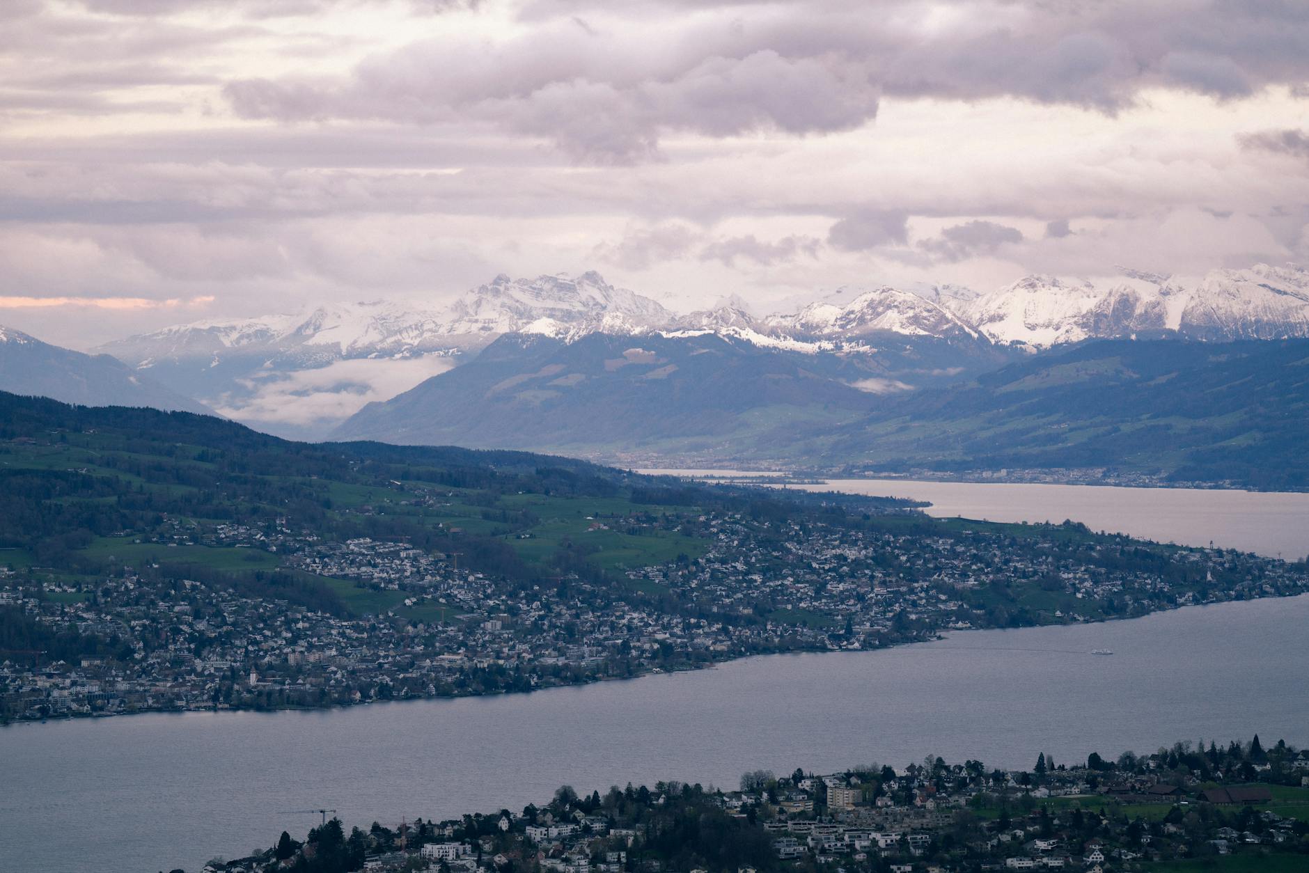 Zurich panorama with lake and Alps context for outdoor gear planning.