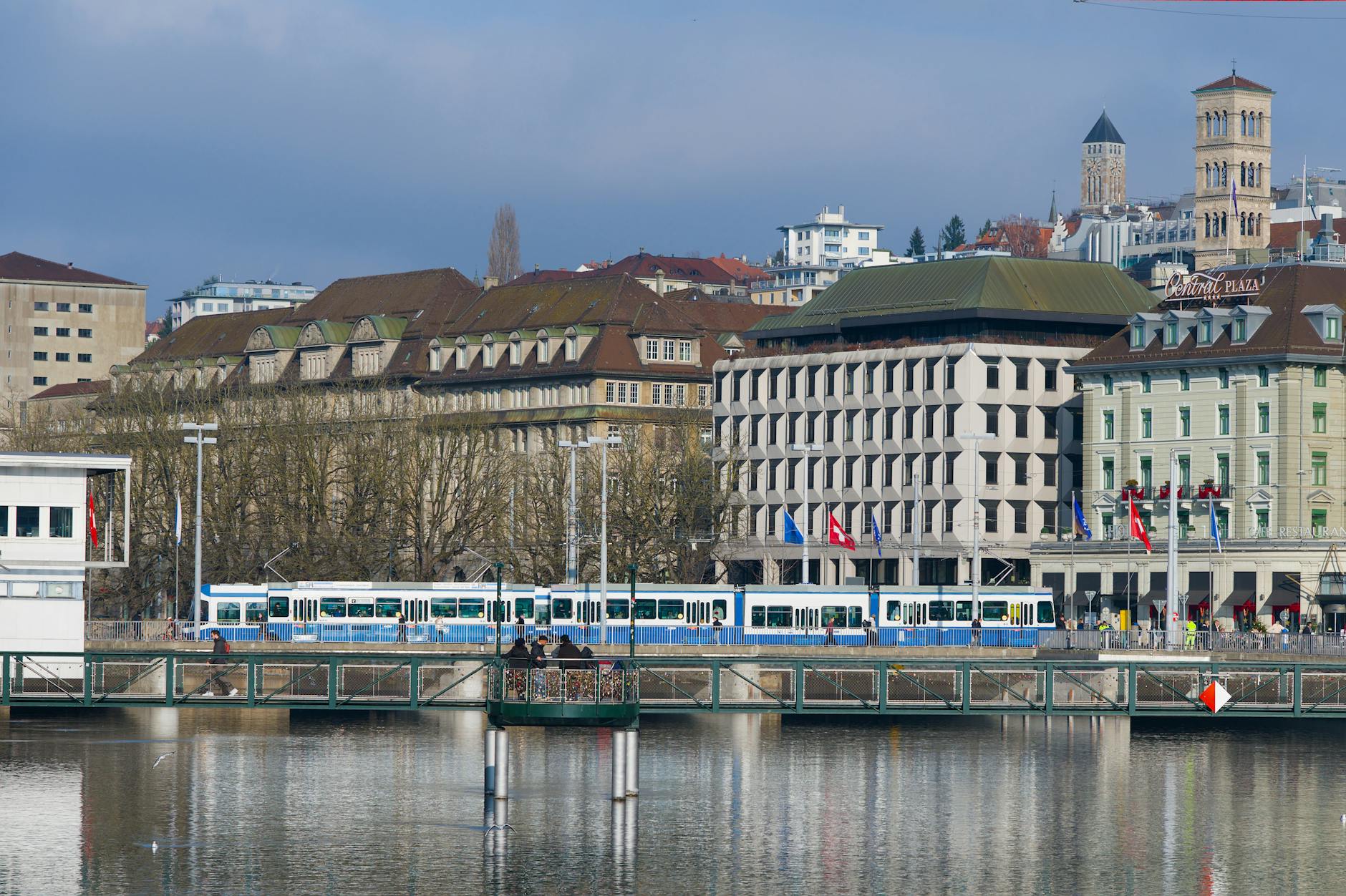 Zurich tram and riverfront context for client meal logistics.