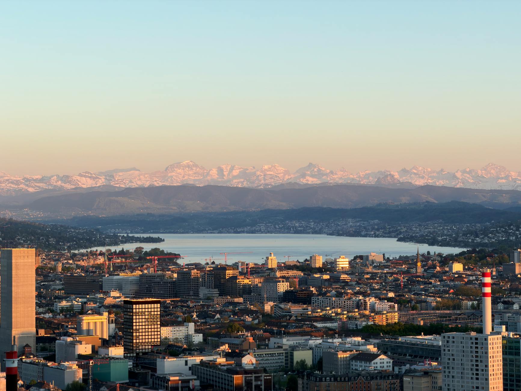 Zurich lake, city, and Alps context for business-trip recovery planning.