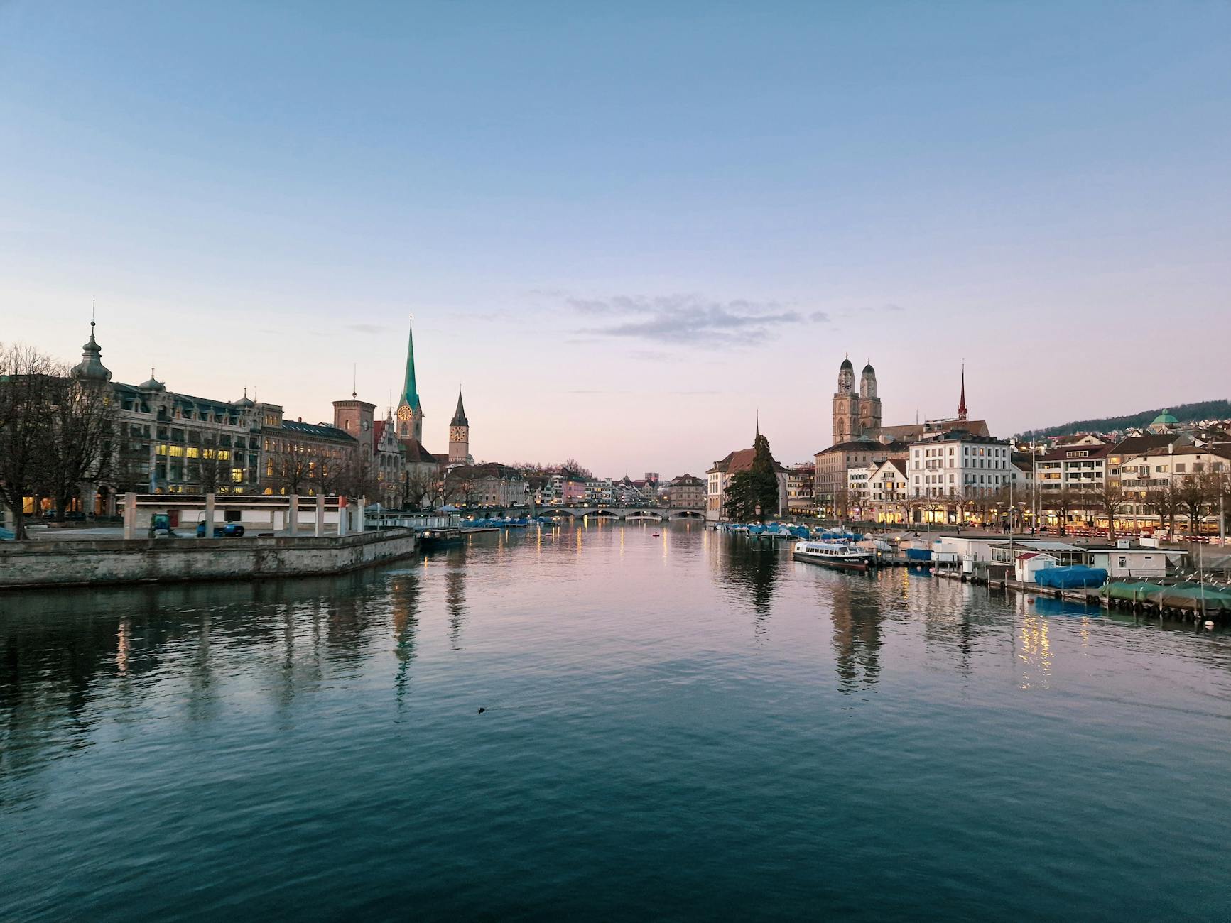 Zurich skyline and river context for consultant travel planning.