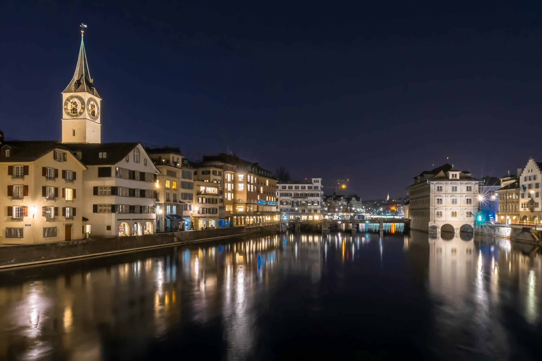 Zurich night river view context for consultant dinners and evening logistics.