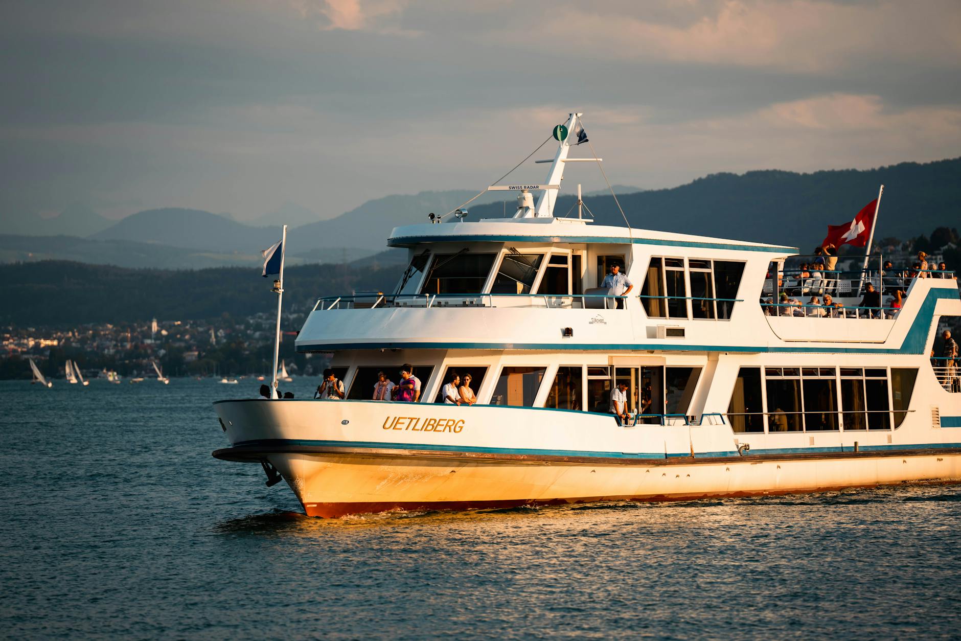 Passenger boat on Lake Zurich context for transfer timing and lake schedules.
