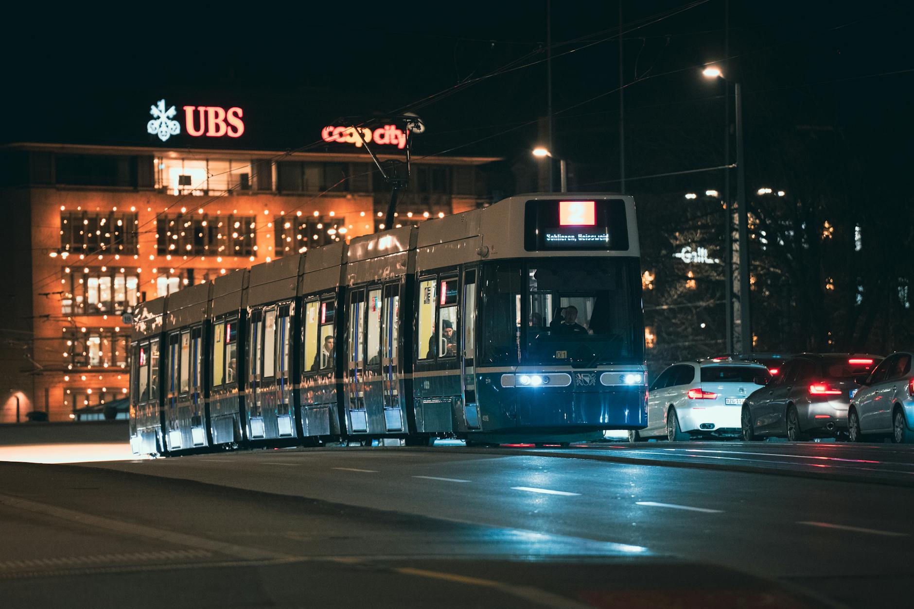 Zurich tram at night context for family transfer planning.